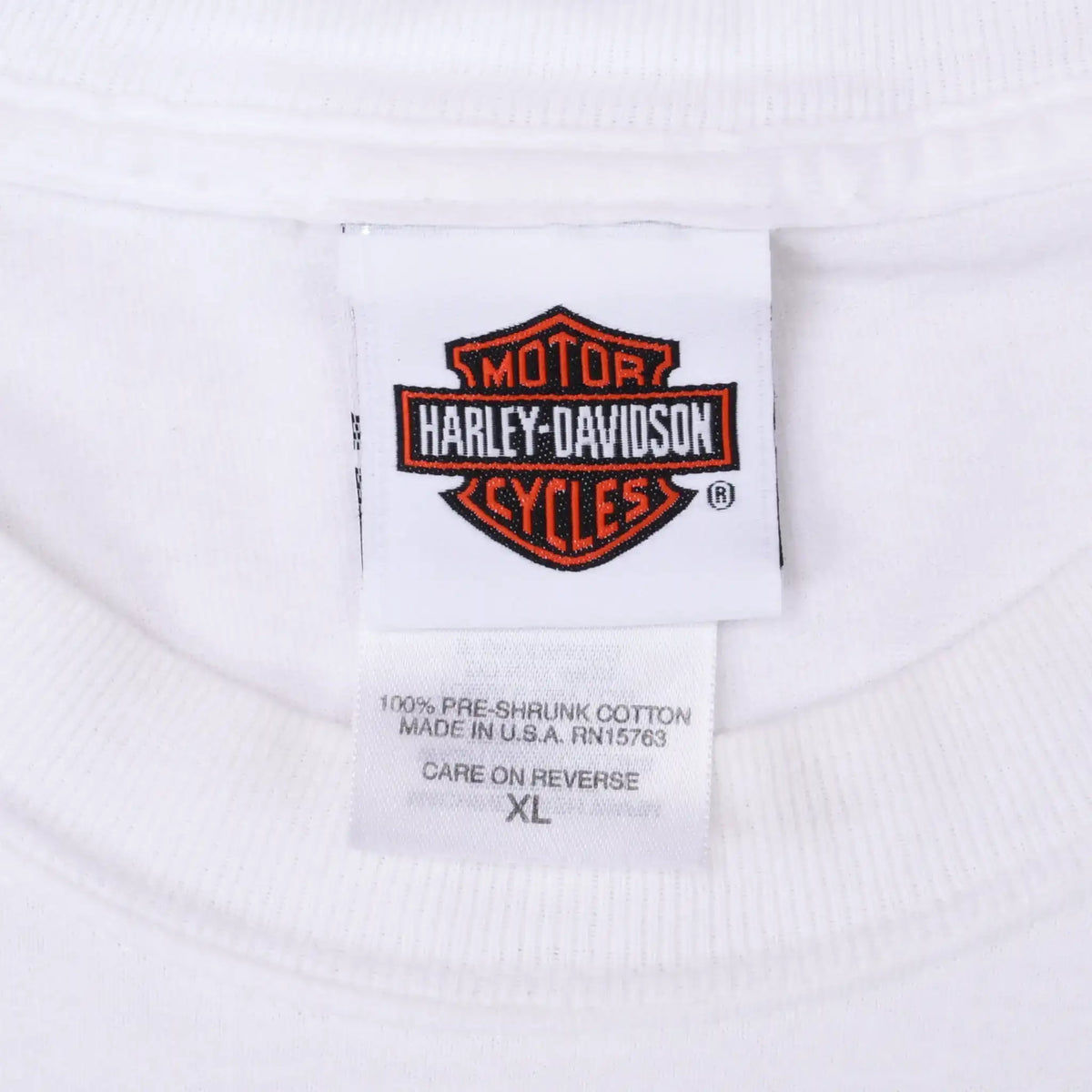 Harley-Davidson neck label and XL care tag inside white T-shirt