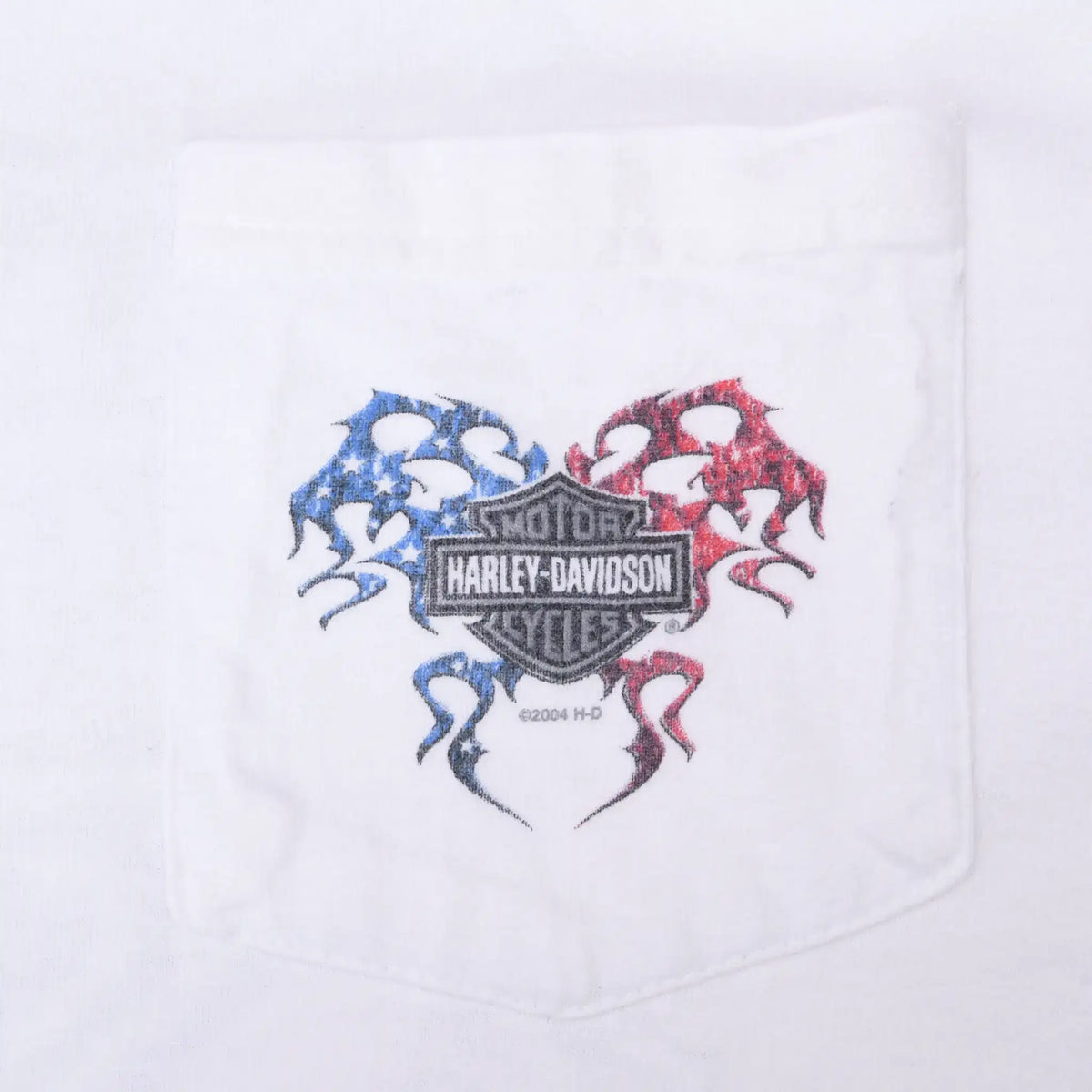 Close-up of chest pocket with Harley-Davidson logo and red and blue tribal graphic