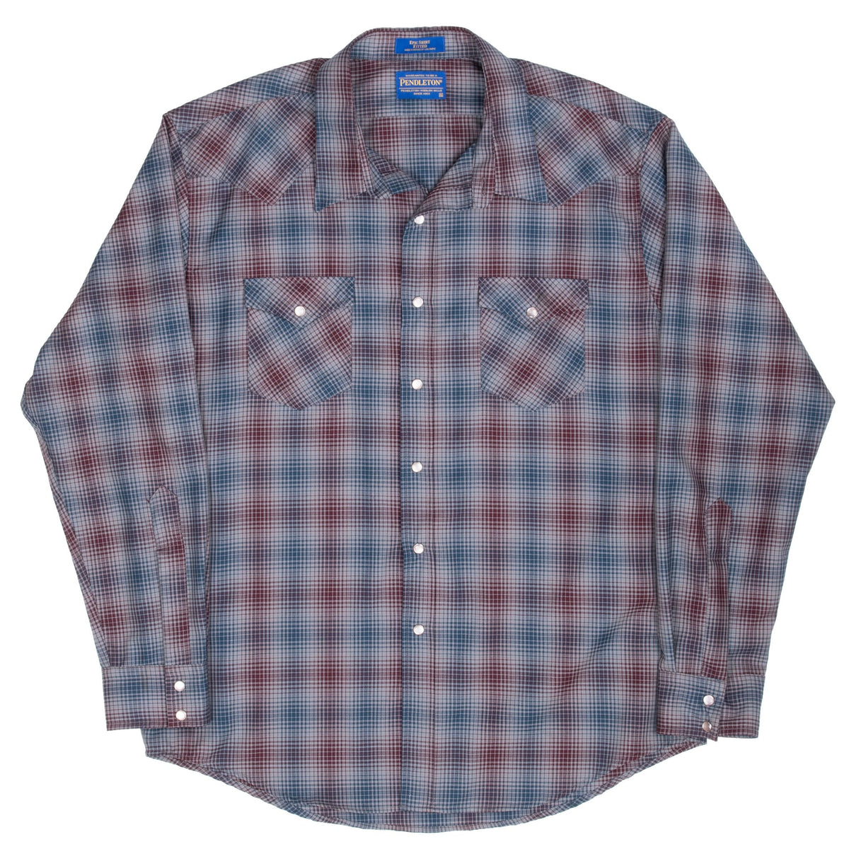 Pendleton plaid western shirt front with pointed chest pockets, snap cuffs and curved hem