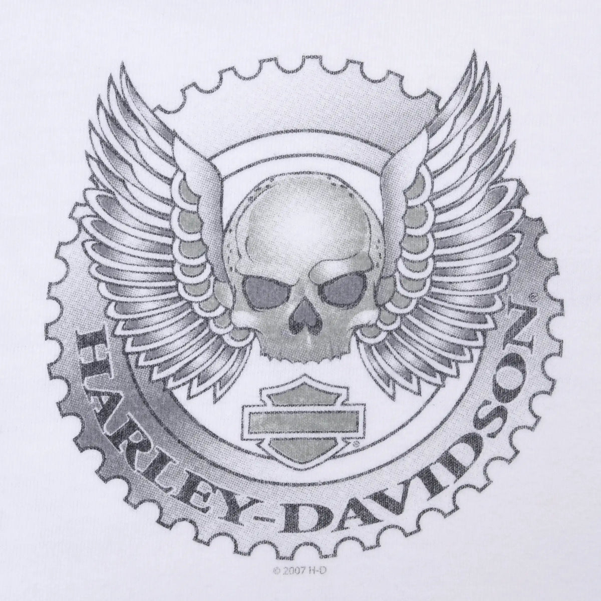 Close-up of Harley-Davidson winged skull and gear chest graphic with 2007 copyright