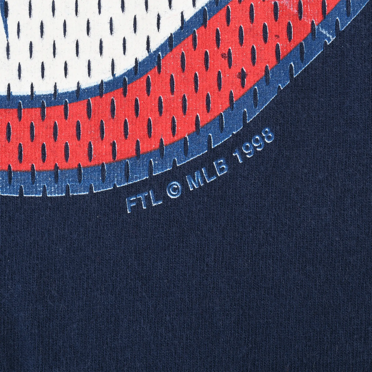 Close-up of Chief Wahoo print with FTL © MLB 1998 marking
