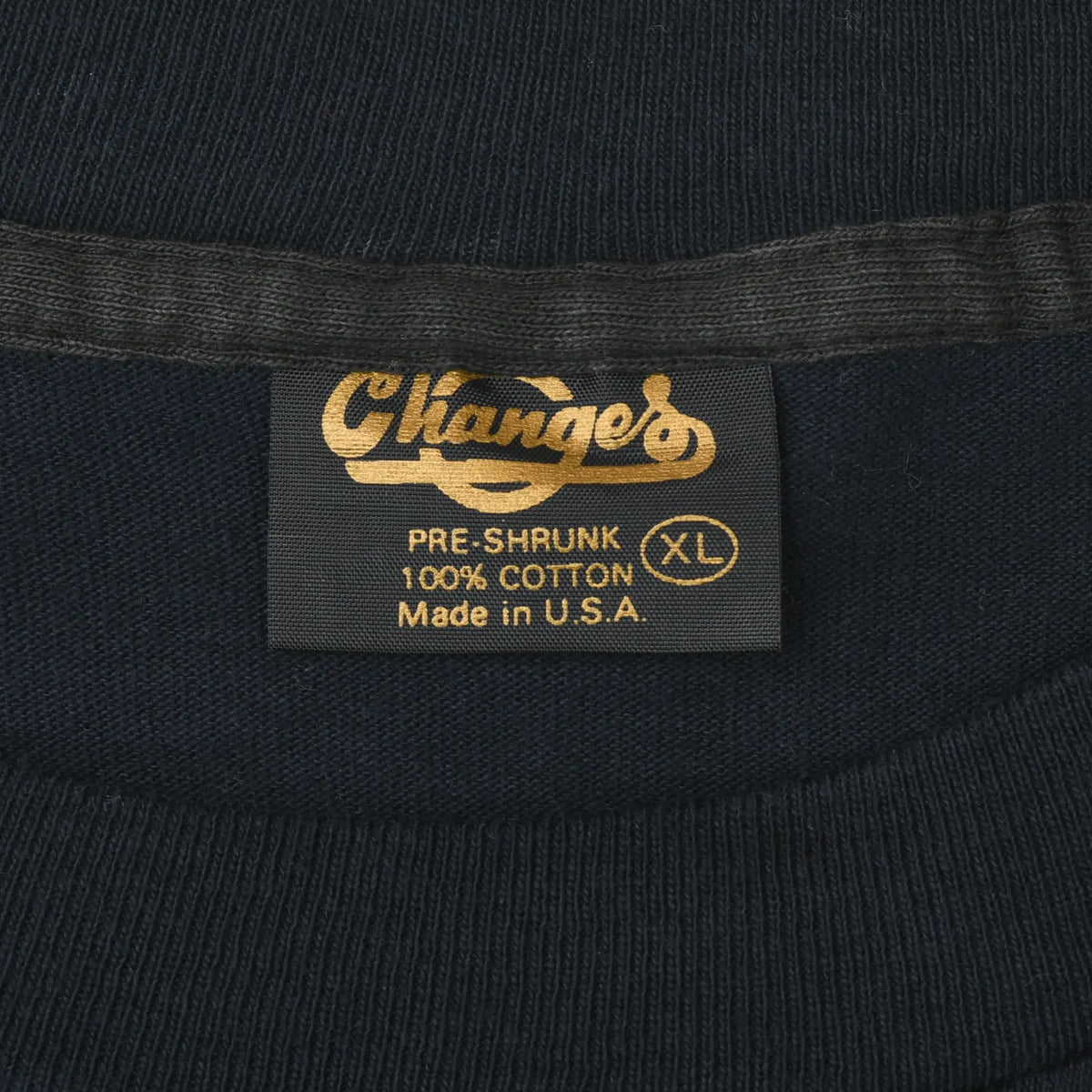 Champion's neck label marked XL, pre-shrunk 100% cotton and Made in U.S.A.