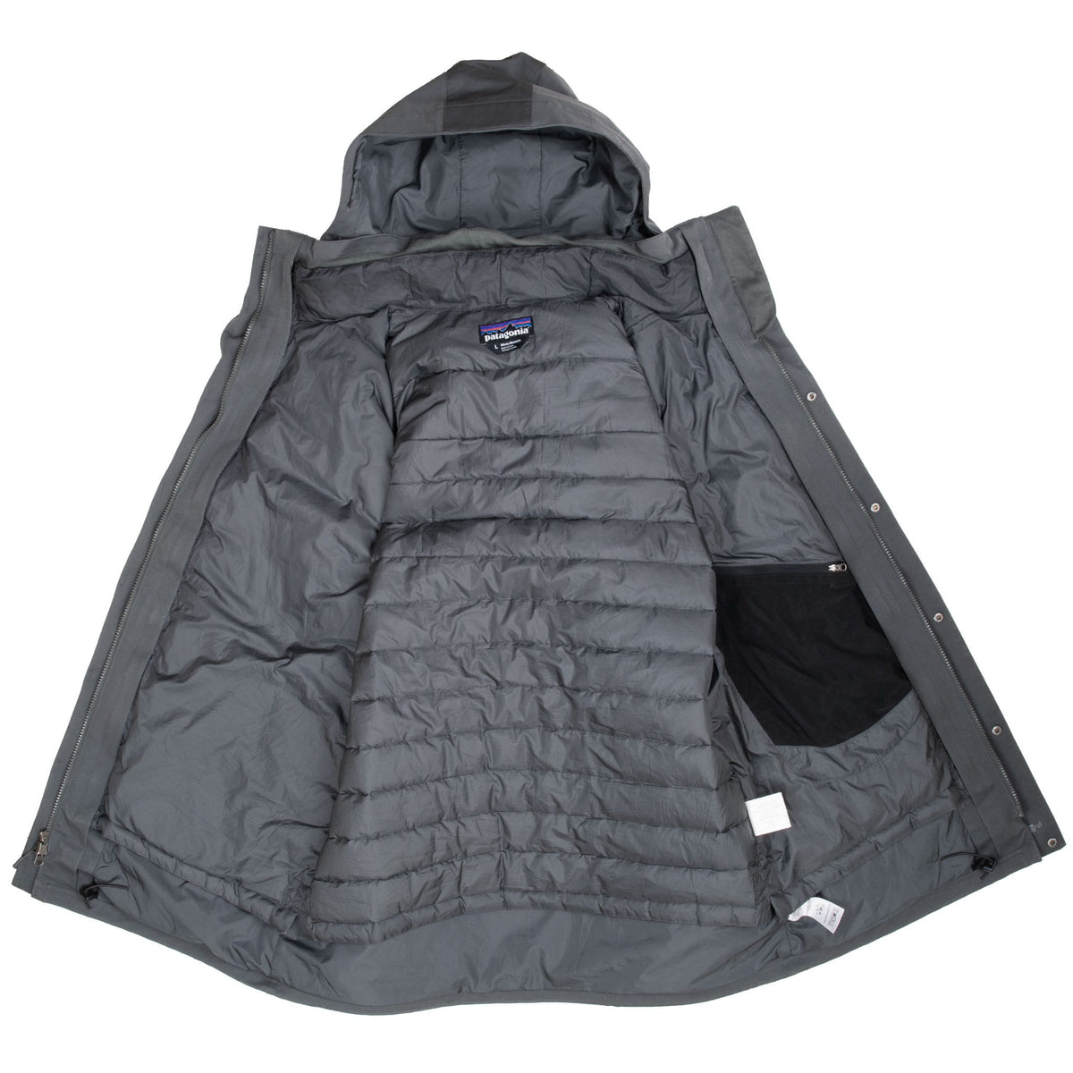 Open grey Patagonia parka showing quilted inner jacket, lining and interior pocket