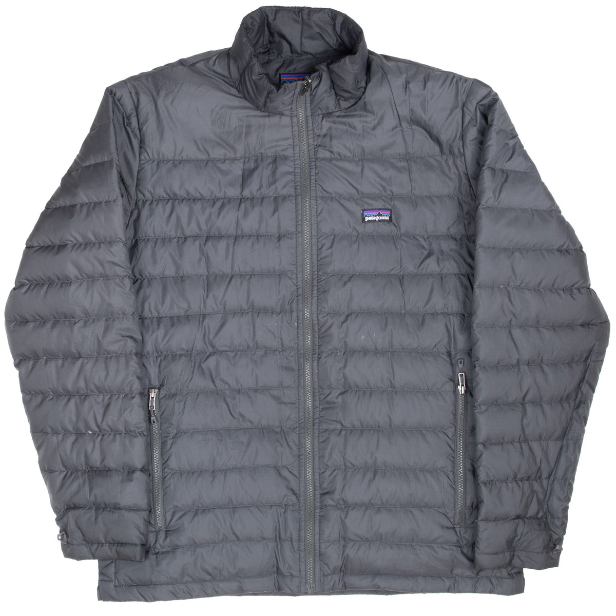 Front of grey Patagonia quilted inner jacket with stand collar and zippered pockets