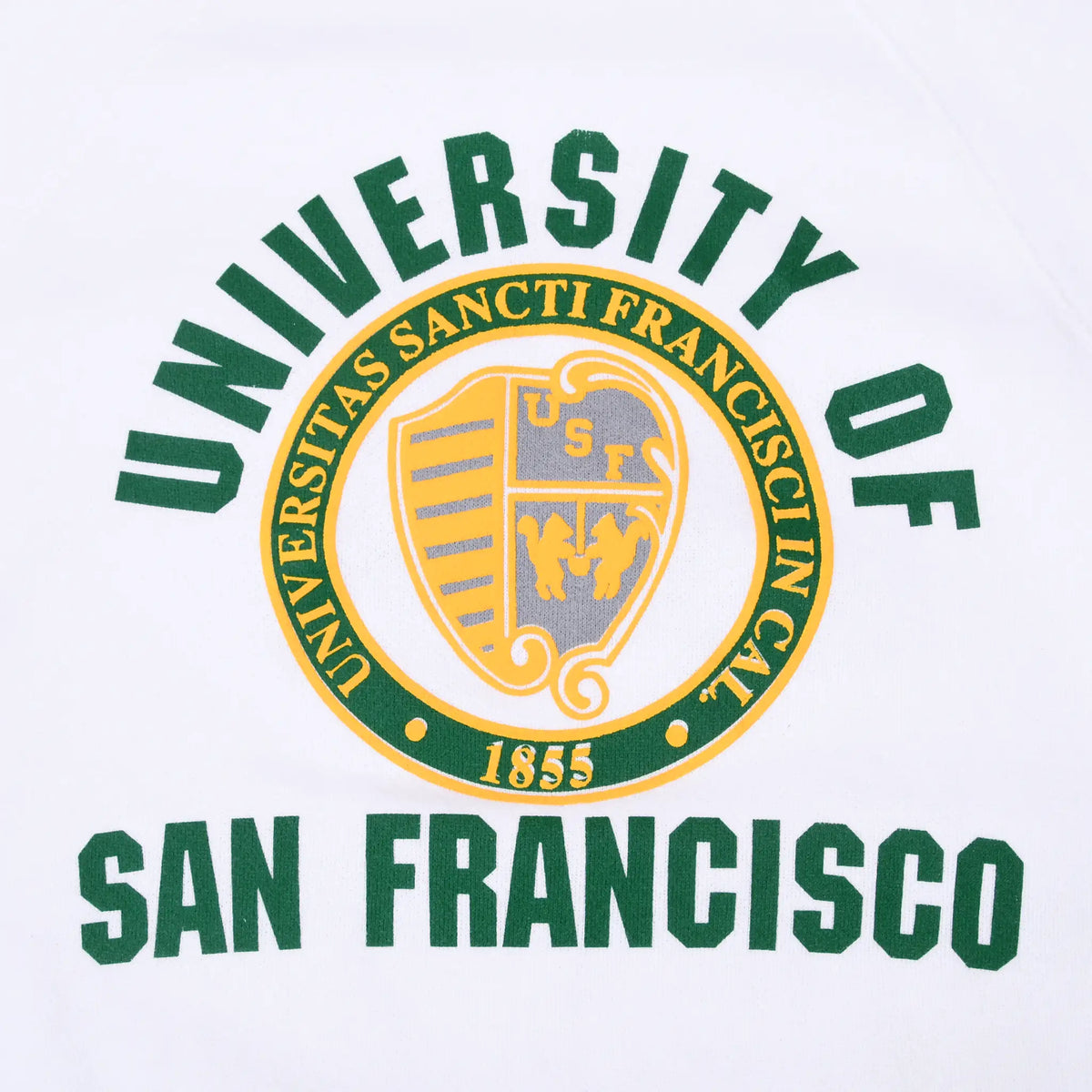 Close-up of green and gold University of San Francisco seal print