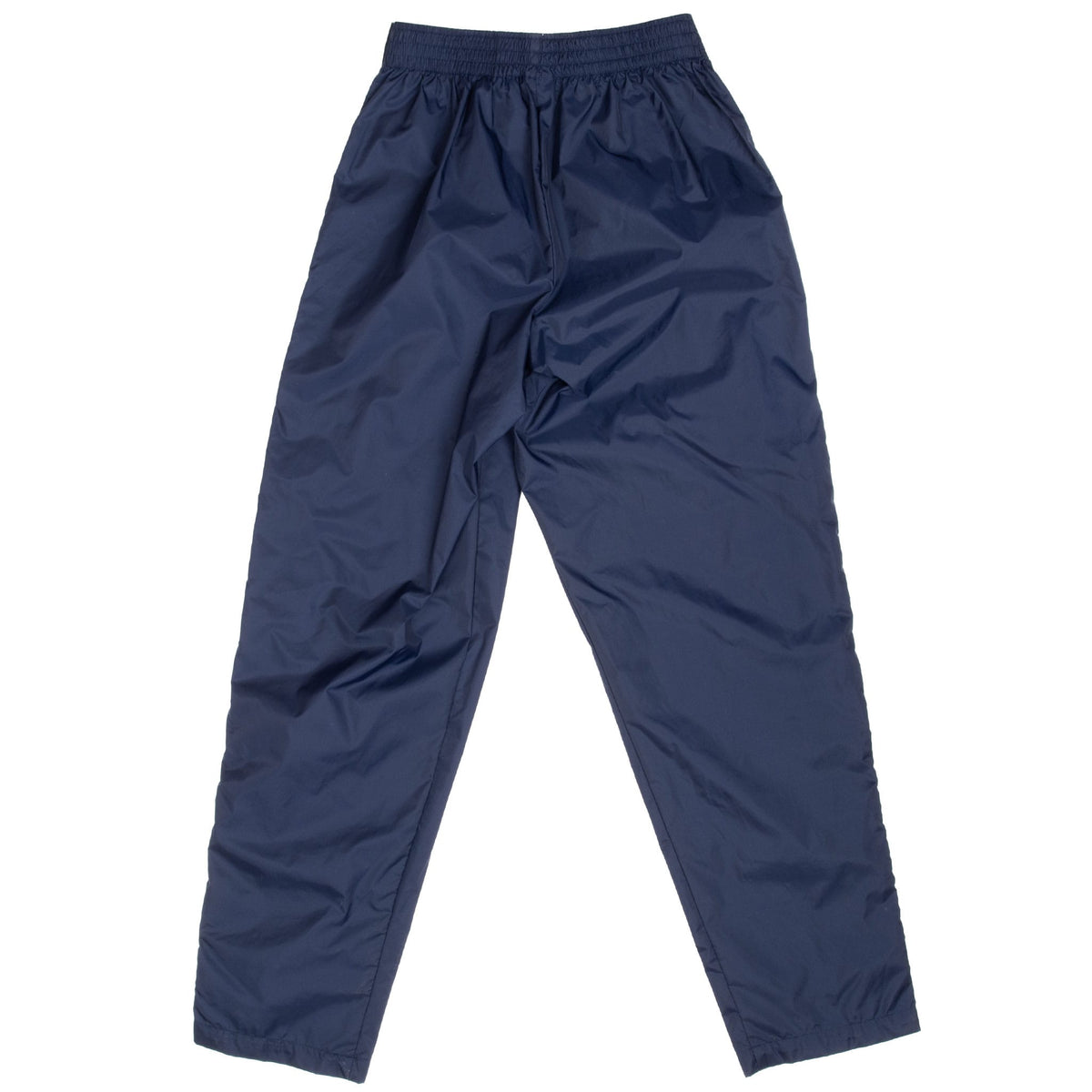 Back of navy blue Nike track pants with elastic waistband and paneled legs