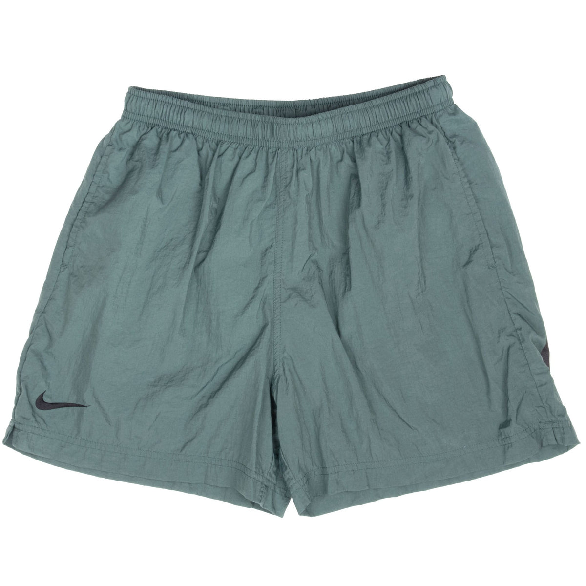 Front of green Nike youth swim trunks with elastic waistband and small black Swoosh