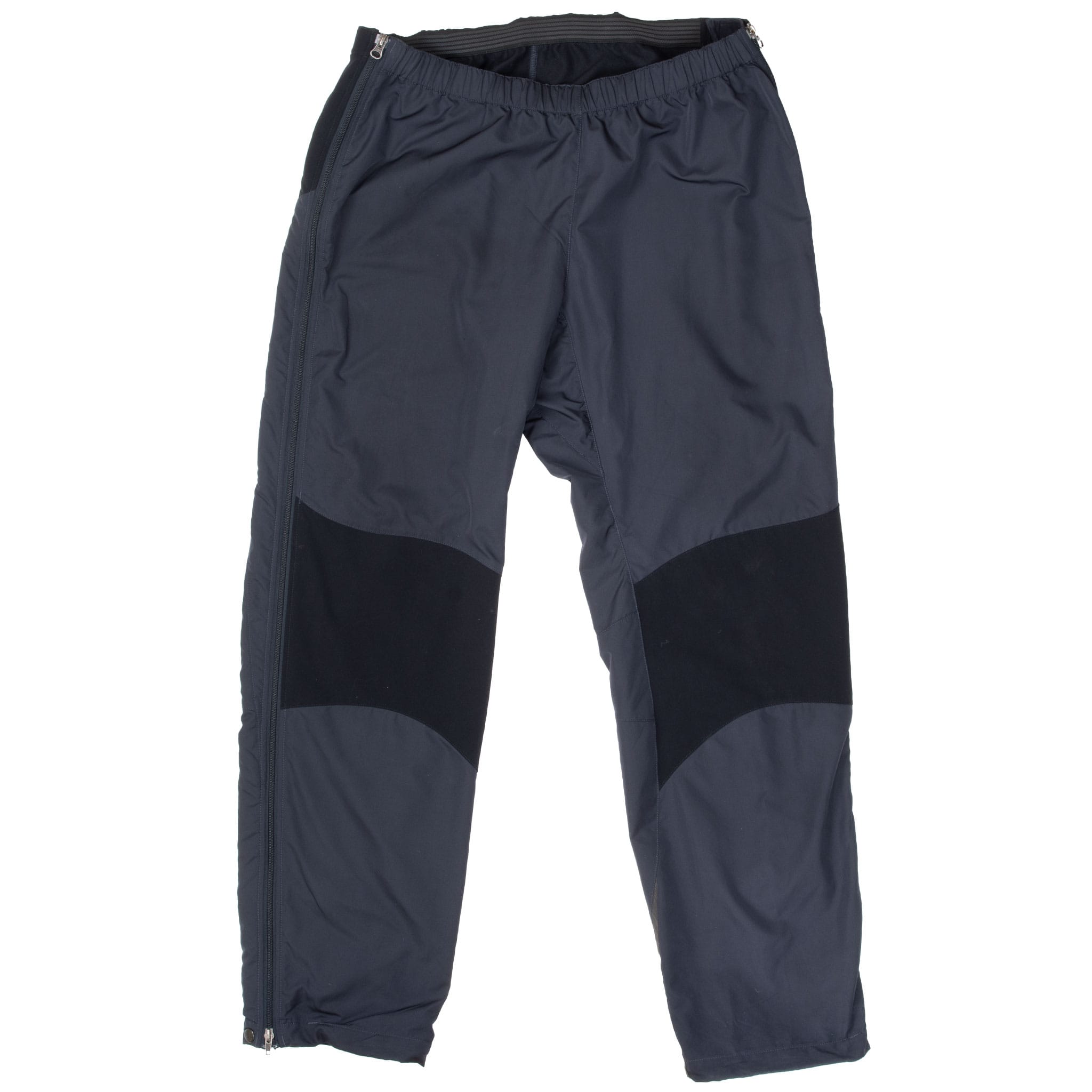 Front of black Patagonia Integral pants with contrasting knee panels and full-length side zippers