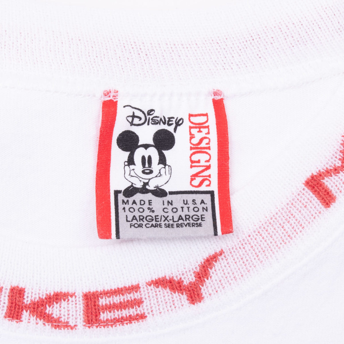 Disney Designs Mickey Mouse neck tag marked XL and made in USA