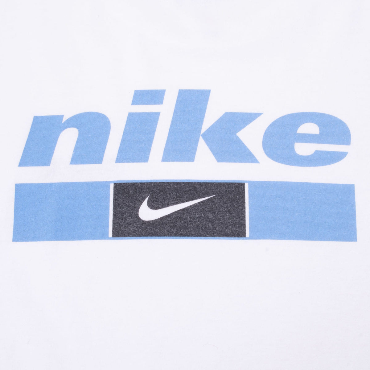 Close-up of back print with light blue Nike wordmark, blue bar, and white Swoosh on dark panel
