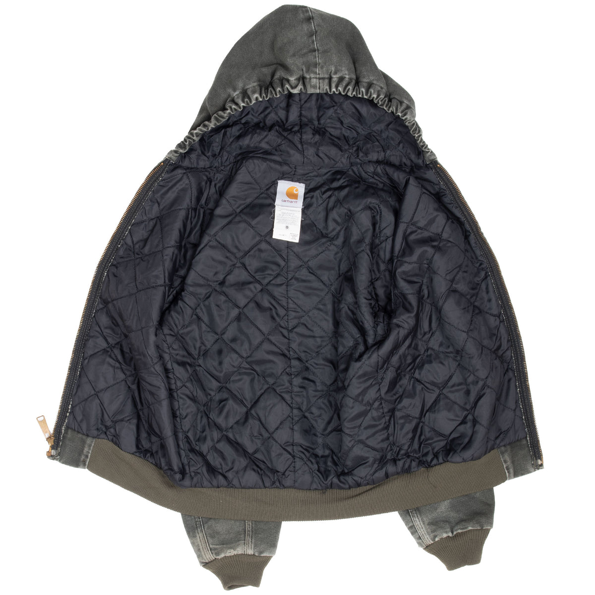 Open Carhartt youth active jacket showing black quilted interior lining