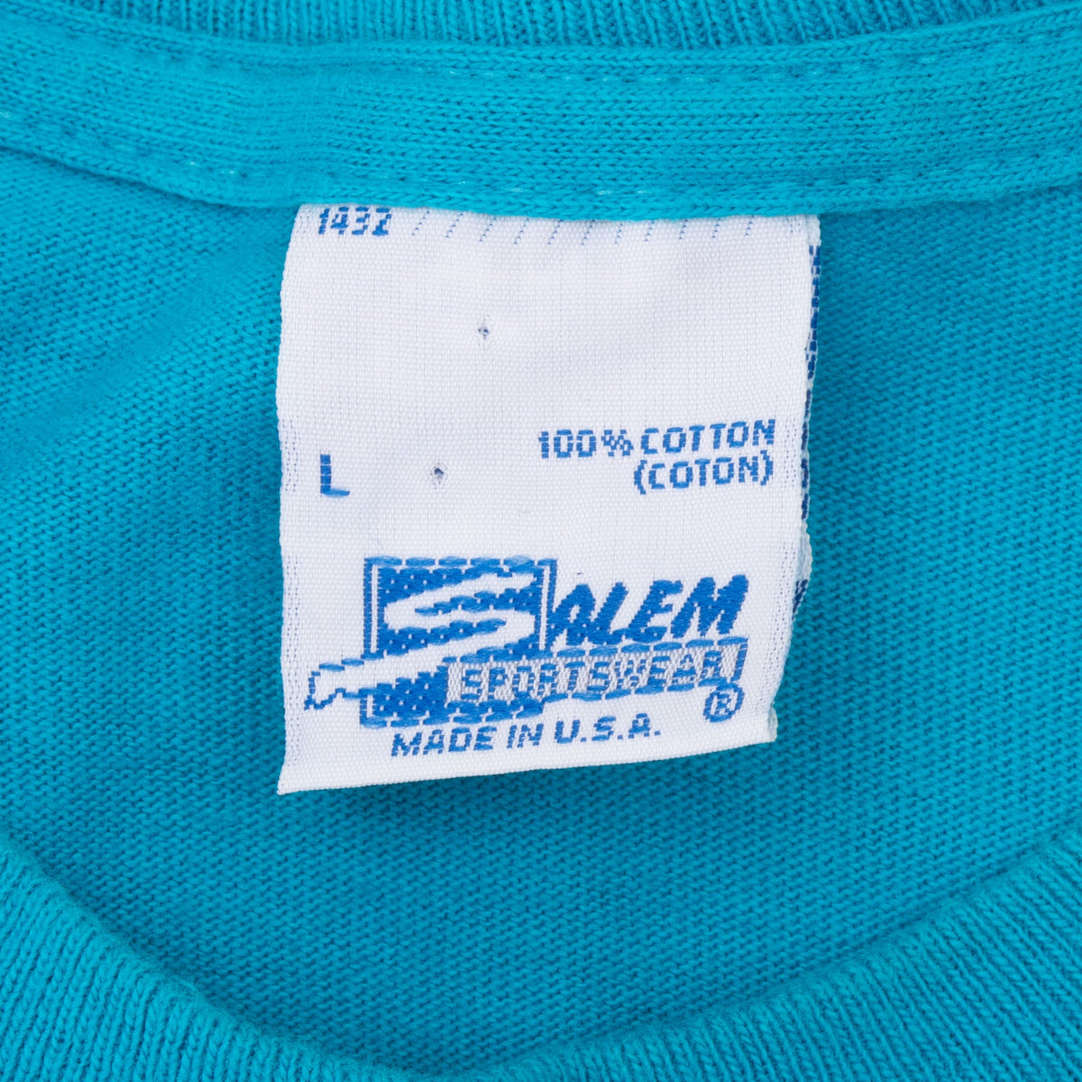 Salem Sportswear neck tag showing size L, 100% cotton and made in USA