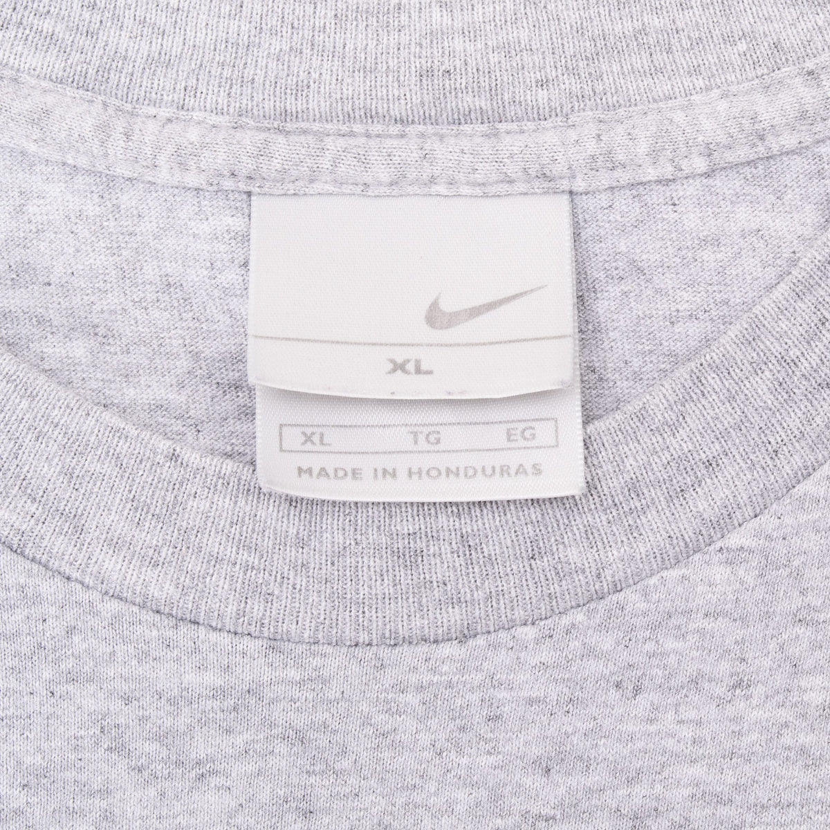 Nike Swoosh neck tag marked XL inside heather grey tank top