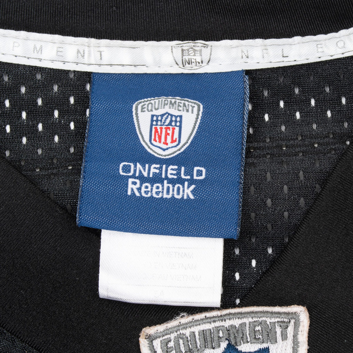 Reebok NFL Equipment neck label inside black mesh jersey