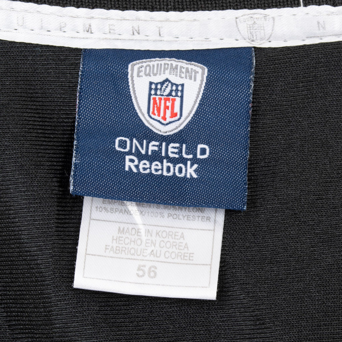 Reebok NFL Equipment neck tag and size 56 label inside jersey