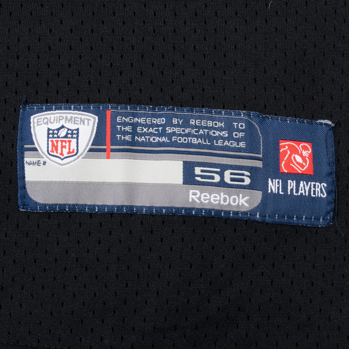 Reebok NFL Equipment size 56 jock tag on black mesh jersey fabric
