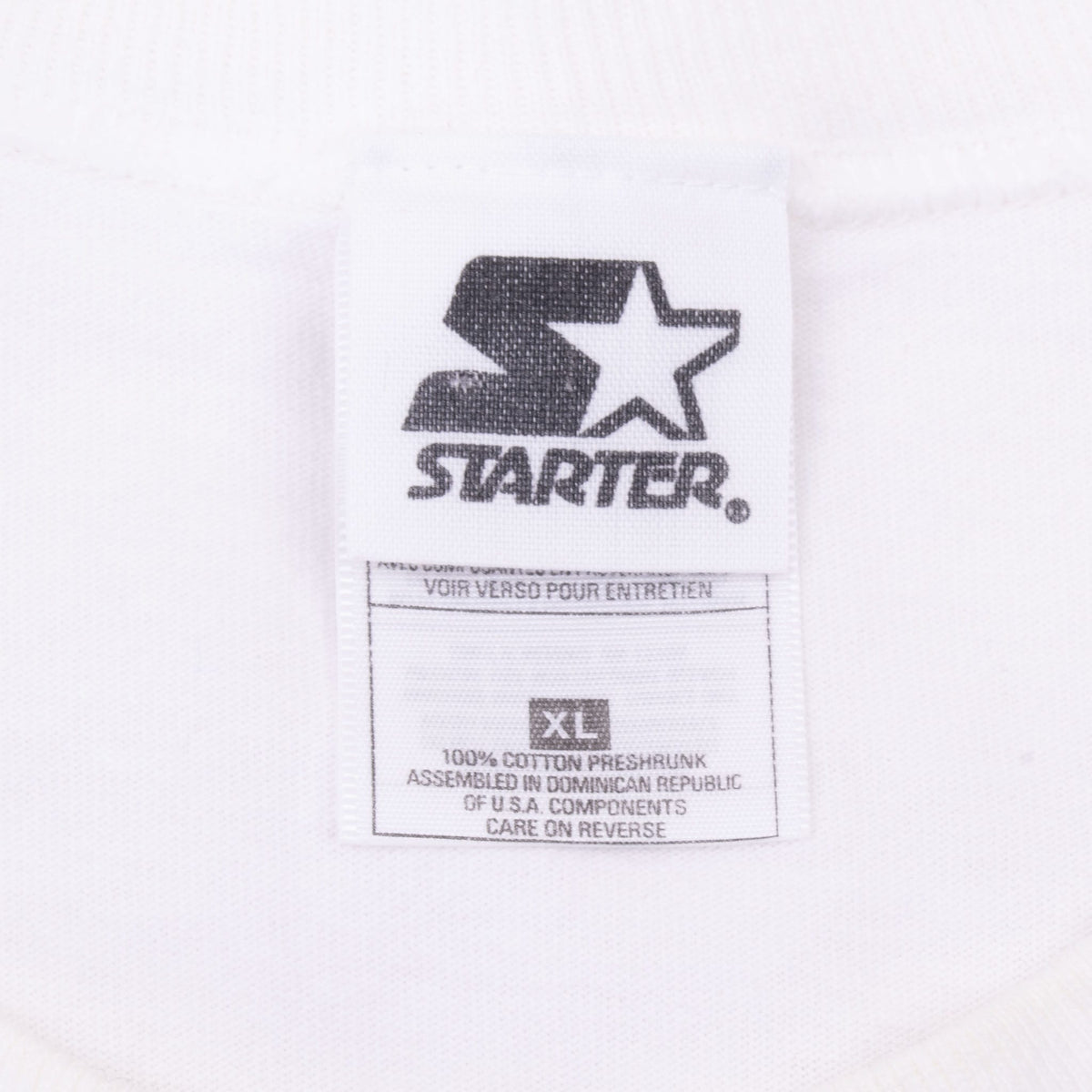 Starter neck label on white T-shirt showing size XL