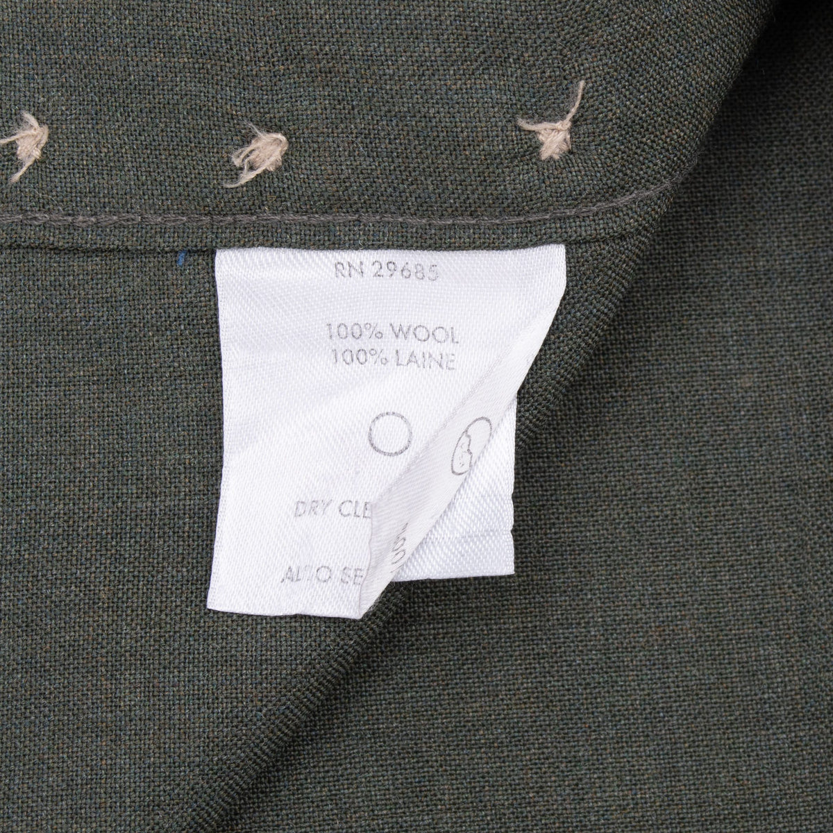 Close-up of Pendleton shirt care tag marked 100% wool and dry clean