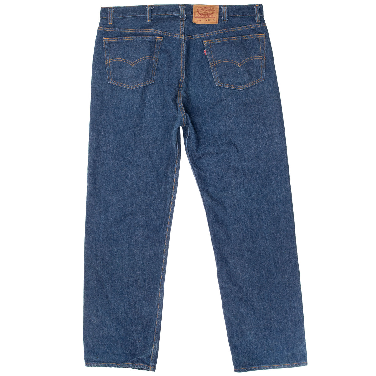 Back of Levi's 501 indigo blue jeans with two pockets and waist patch