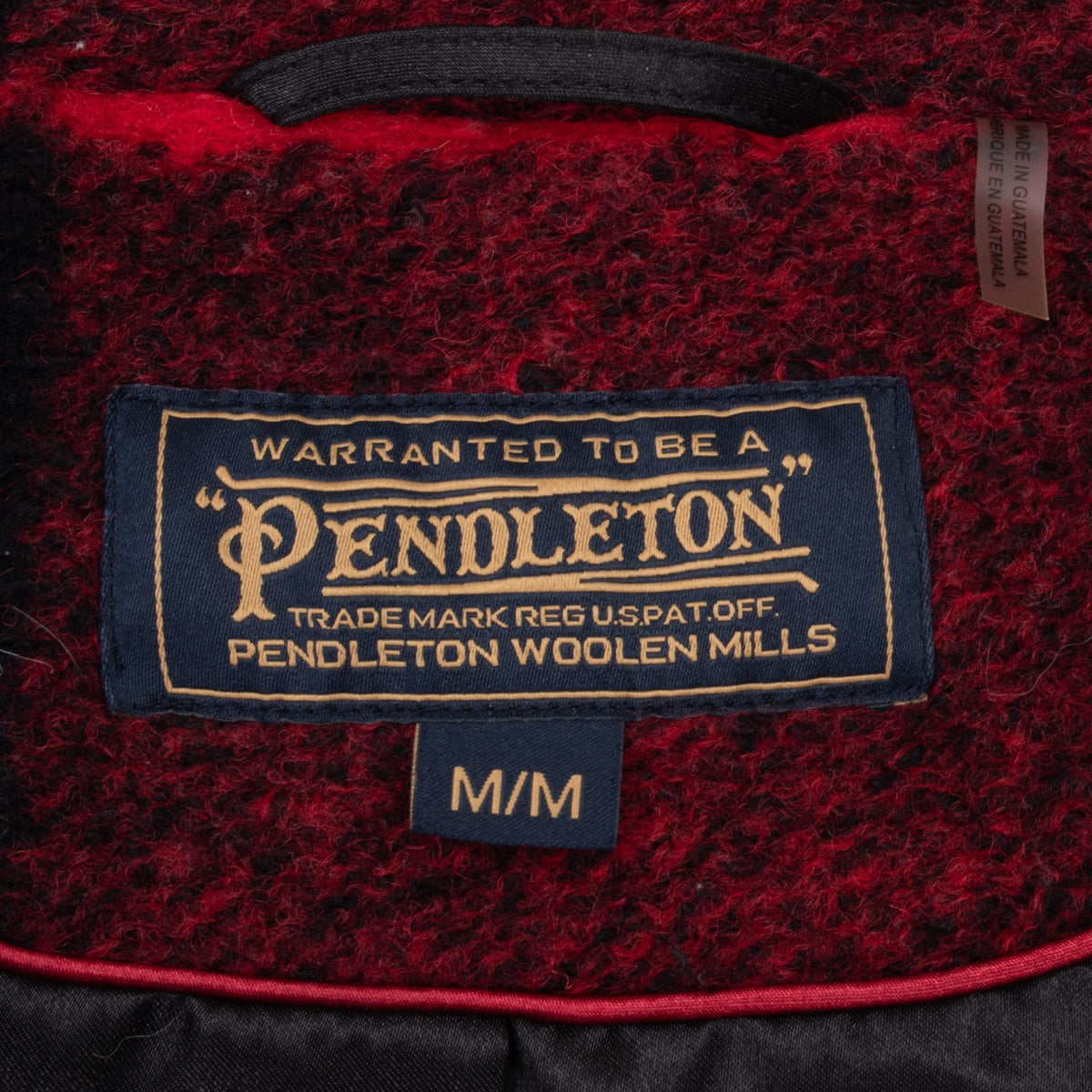 Pendleton Woolen Mills neck label and medium size tag inside plaid coat