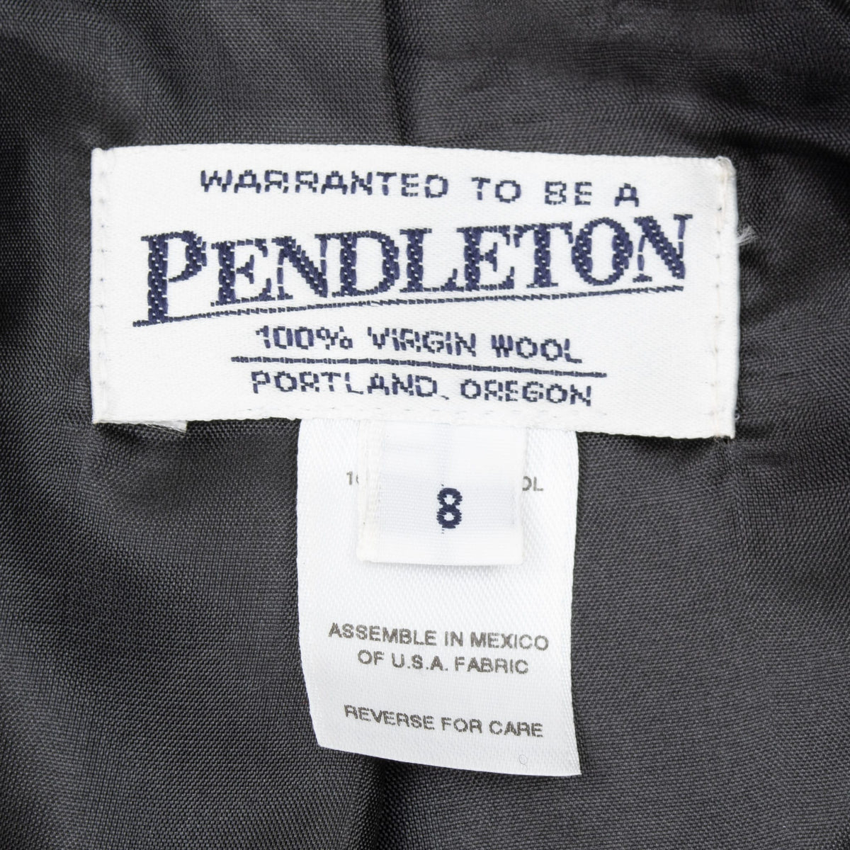 Pendleton blazer brand, wool content, care, and size 8 labels inside dark lining