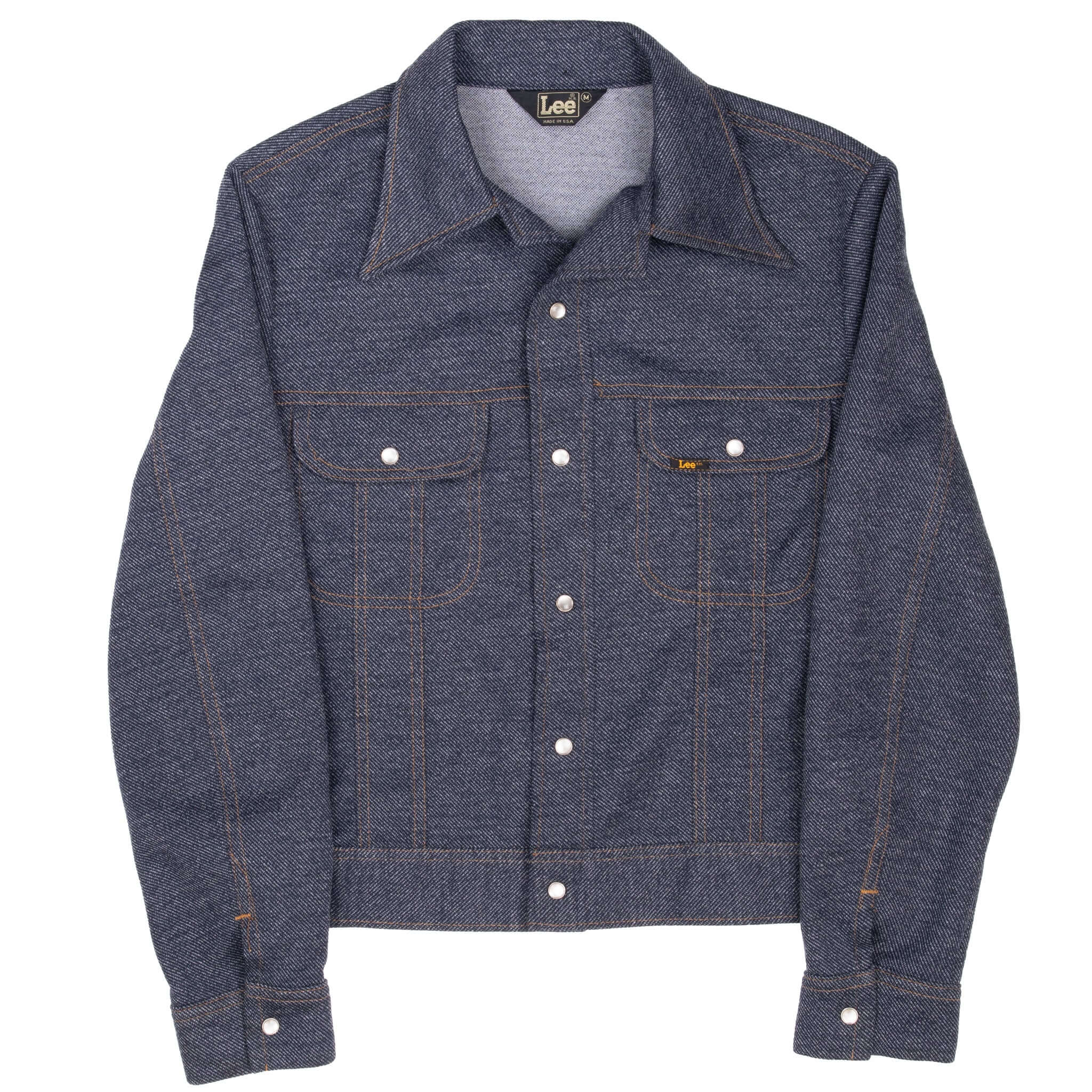 Full front of dark blue Lee jacket with pearl snap buttons and contrast stitching
