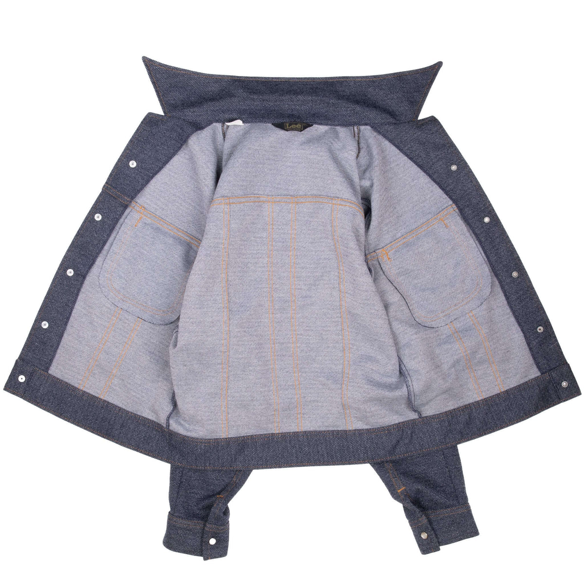 Open Lee jacket showing light blue interior, pearl snaps, and orange seams