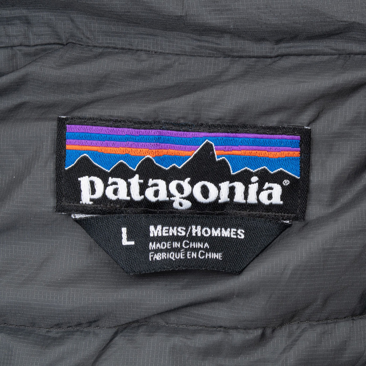 Patagonia neck label on quilted inner jacket showing men's size L
