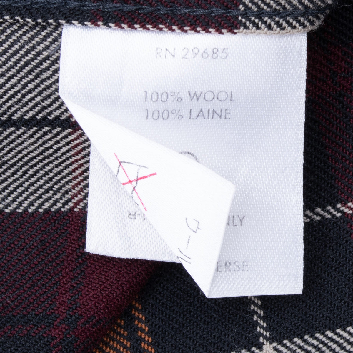 Close-up of the interior Pendleton shirt fabric label marked 100% wool