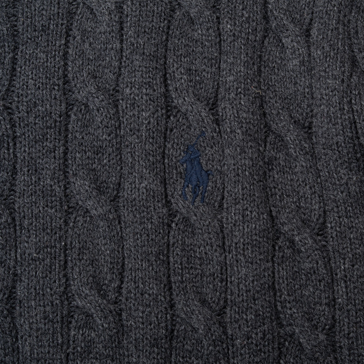 Polo pony embroidery detail on dark grey cable-knit sweater
