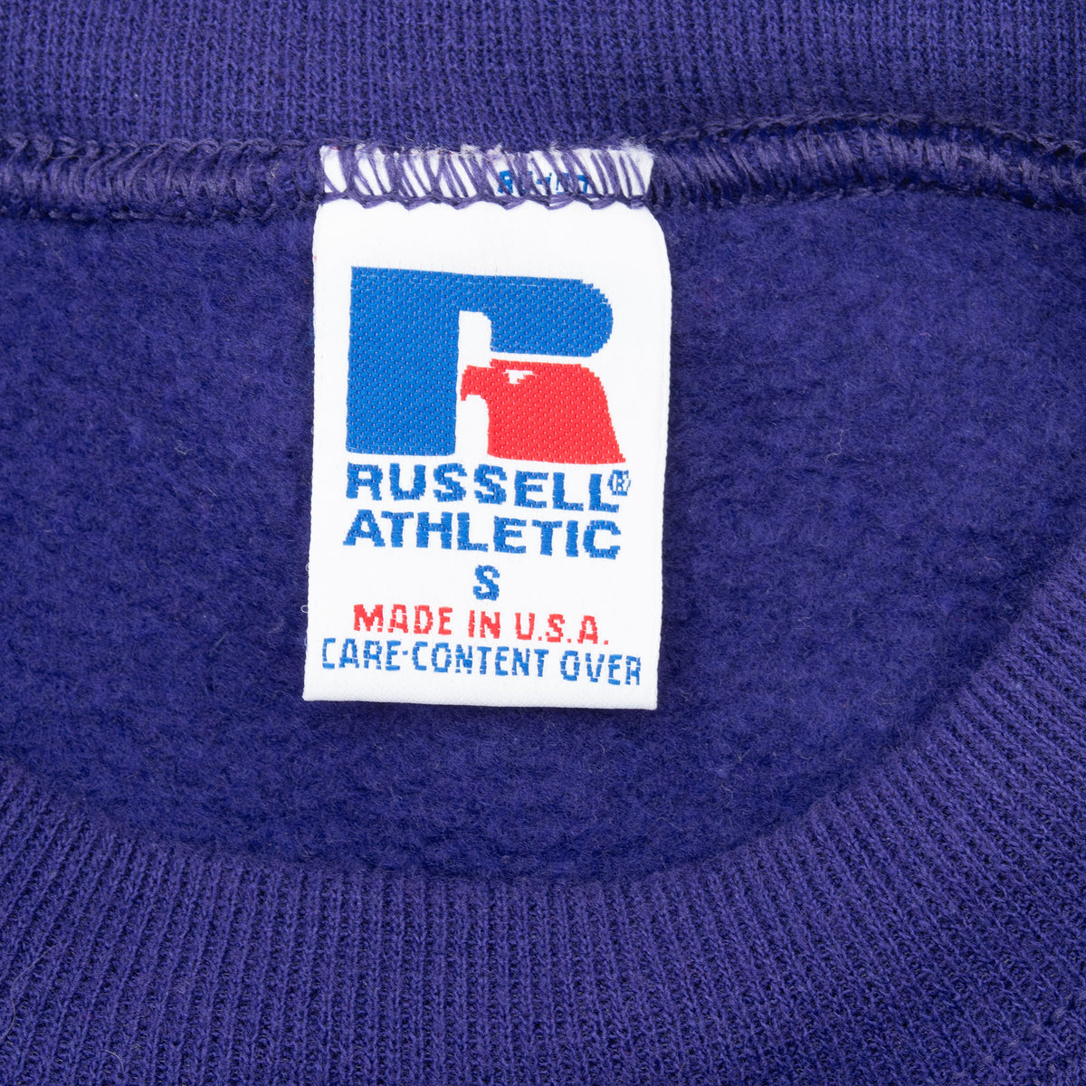 Russell Athletic small Made in USA neck tag on purple sweatshirt