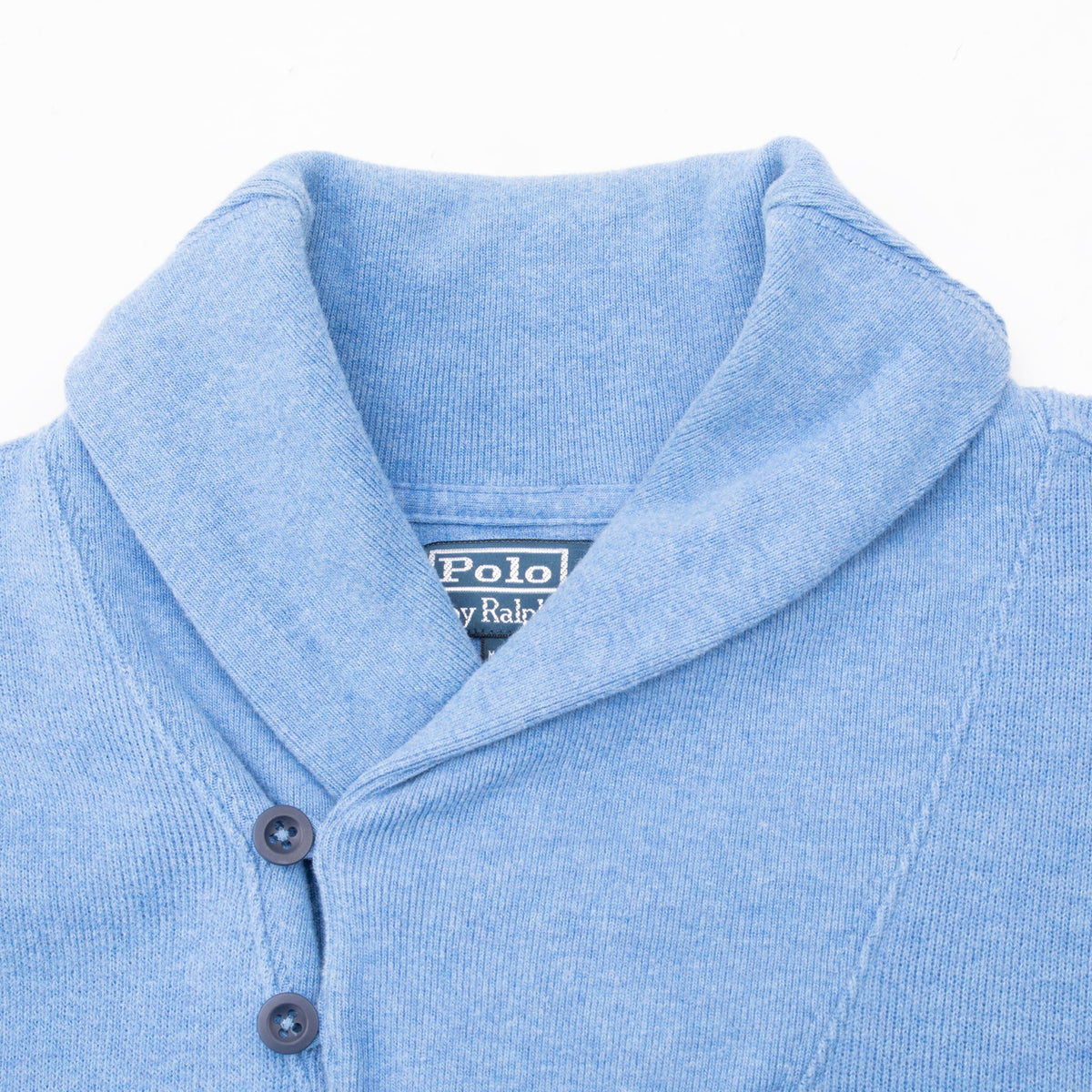 Close-up of blue shawl collar and two-button neckline on Polo Ralph Lauren sweater