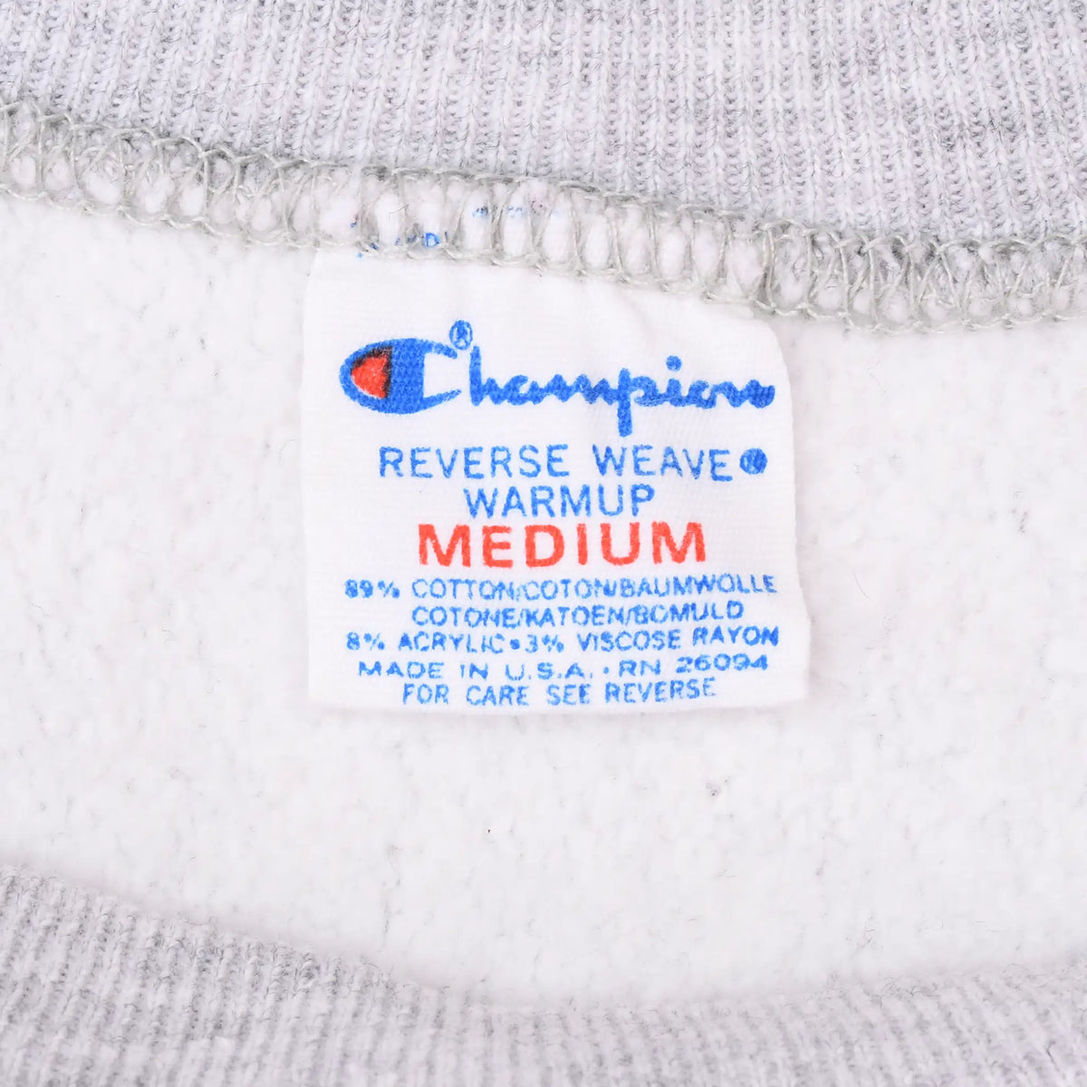 Champion Reverse Weave Warmup medium neck tag with fabric and care details