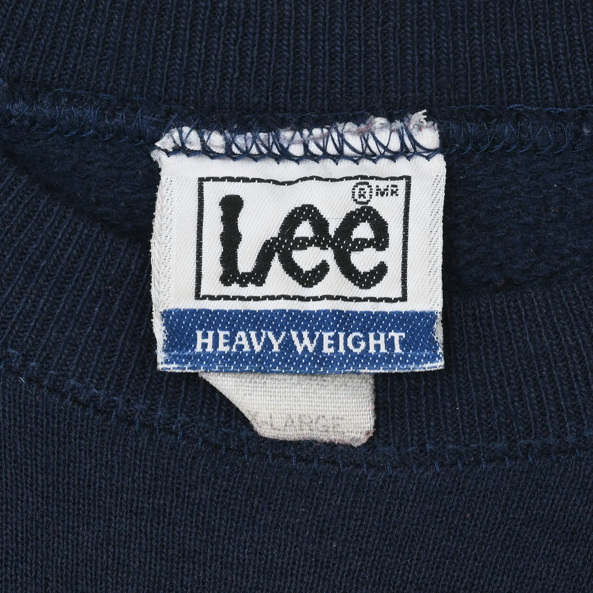Close-up of Lee Heavyweight neck label inside navy sweatshirt