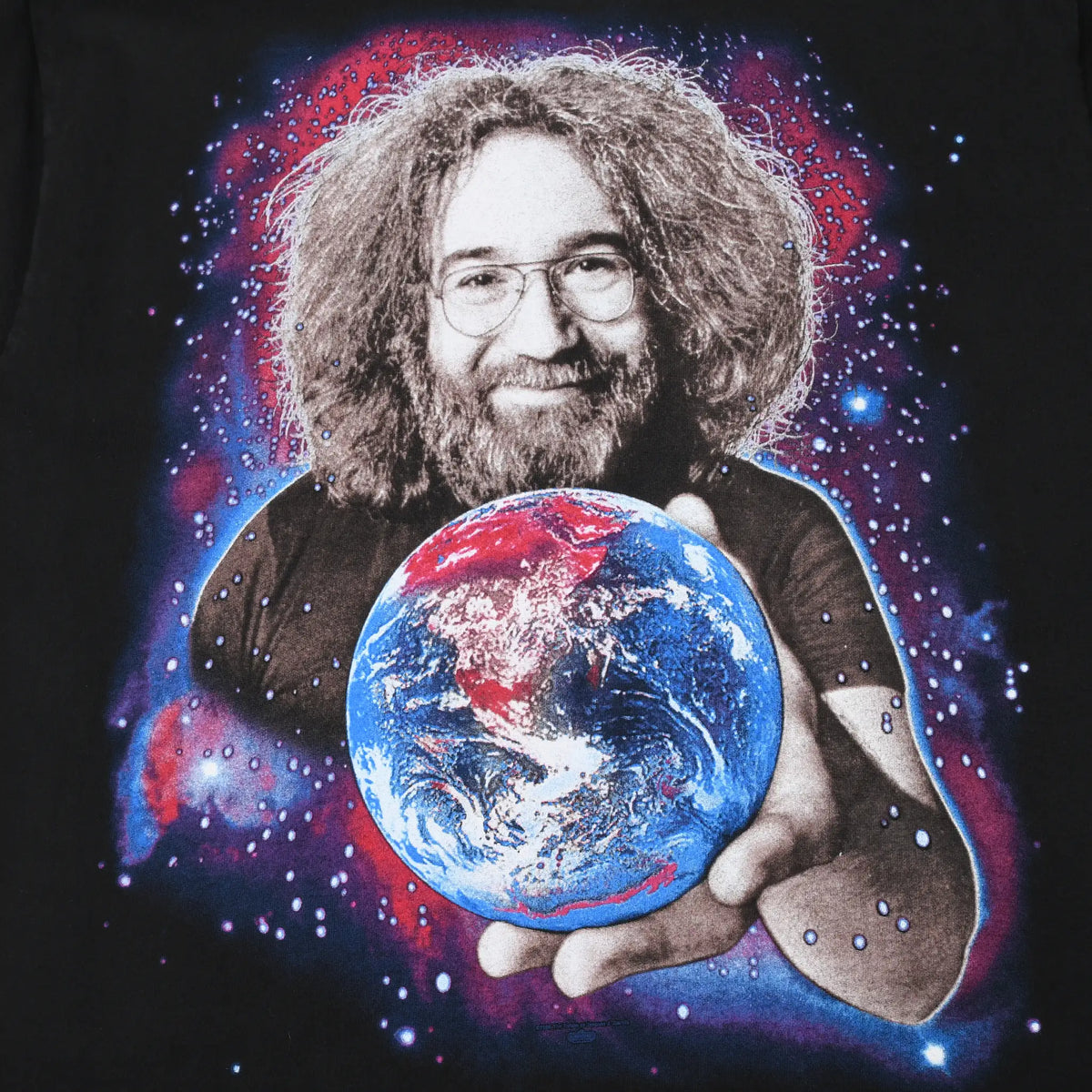Close-up of Jerry Garcia portrait holding Earth against a red and blue cosmic background