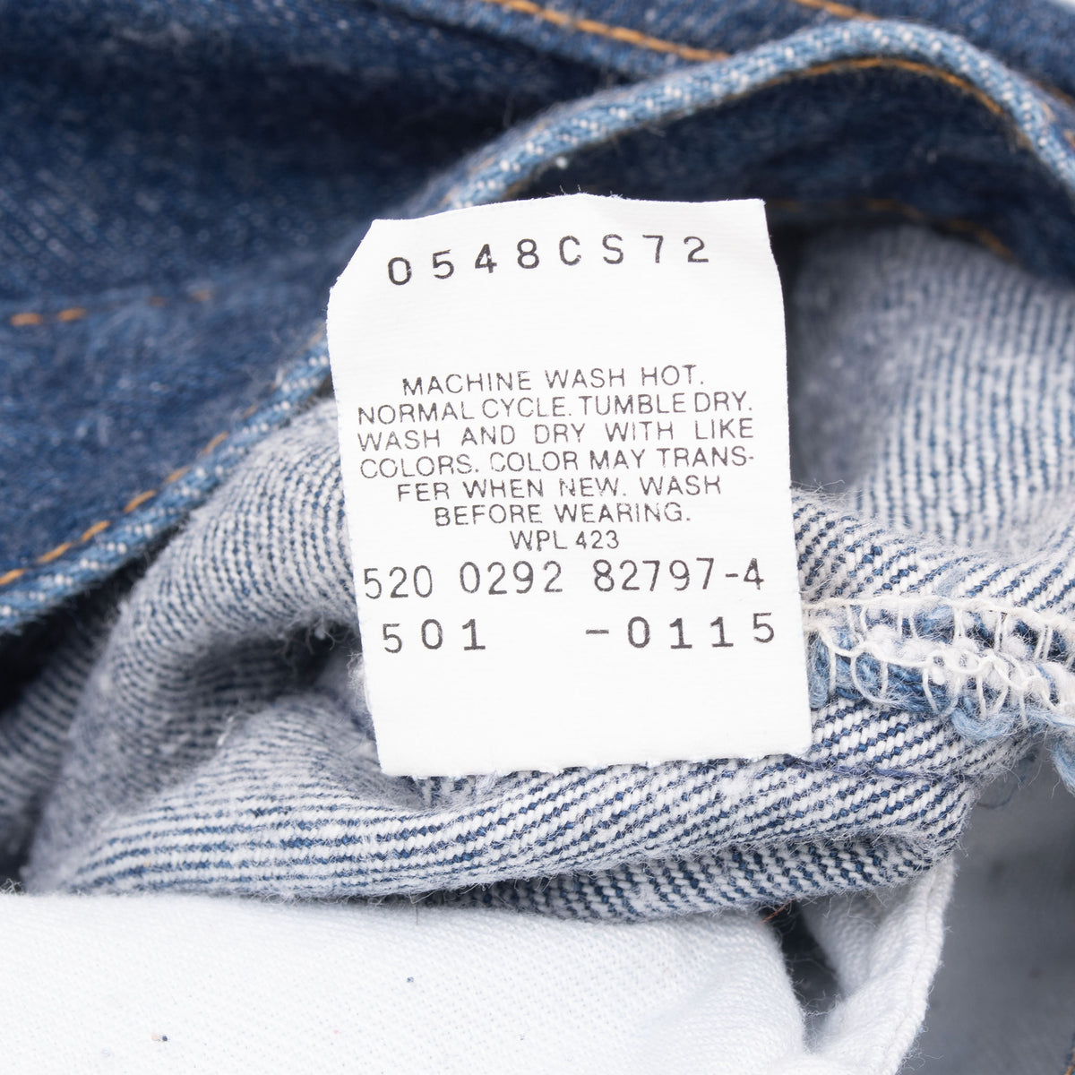 Reverse of Levi's care label with washing instructions and product codes