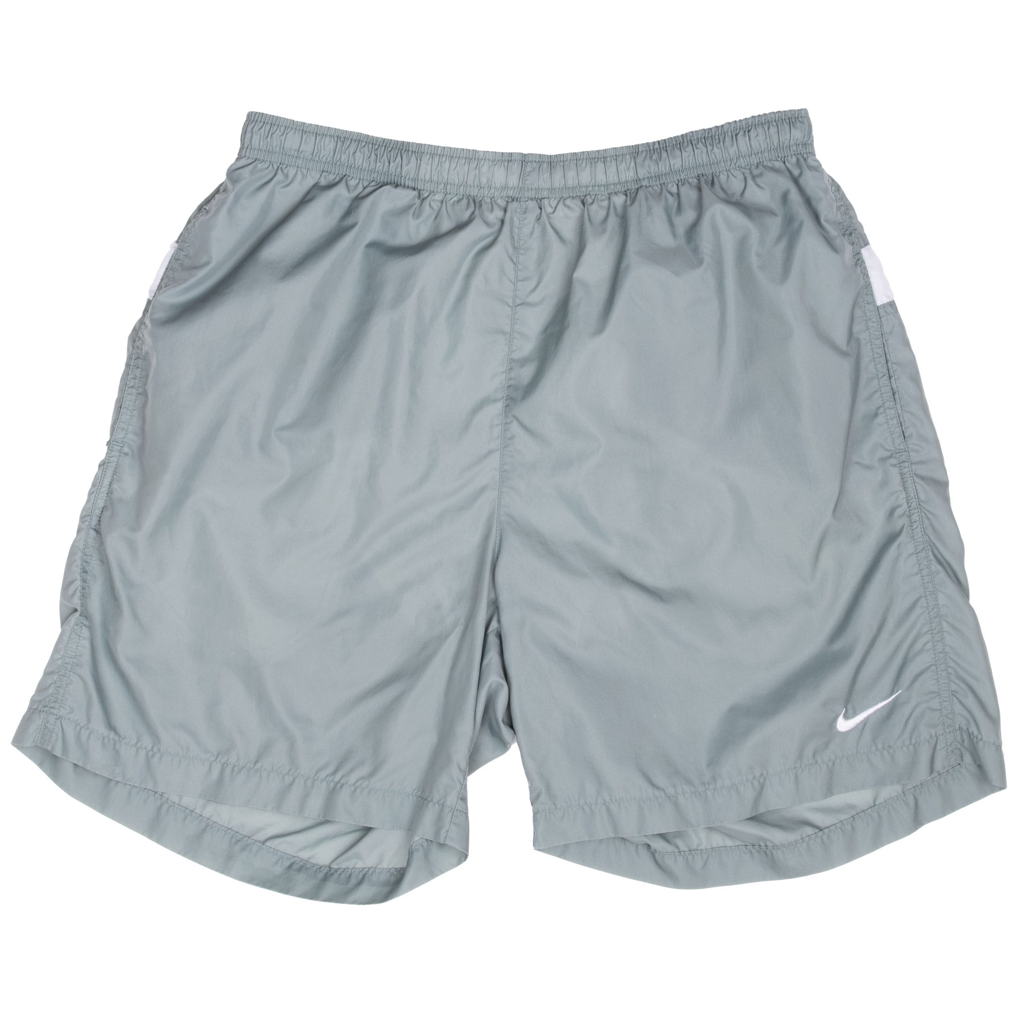 Front of green Nike swimming trunks with elastic waistband, side pockets and white embroidered Swoosh