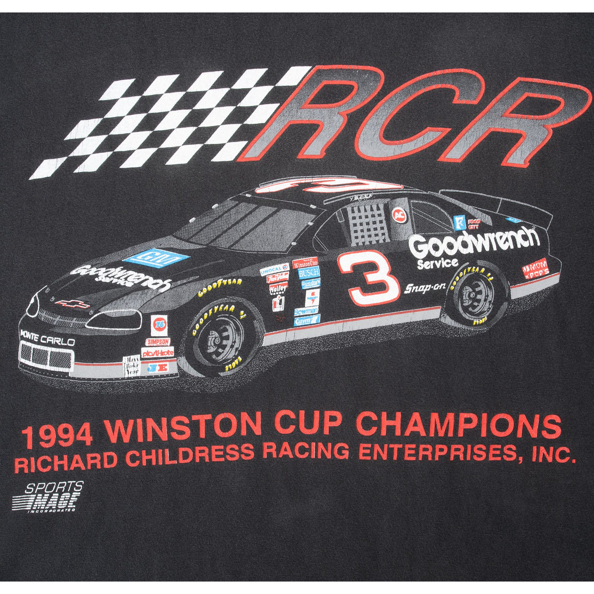 Close-up of RCR No. 3 Goodwrench car and 1994 Winston Cup Champions front print