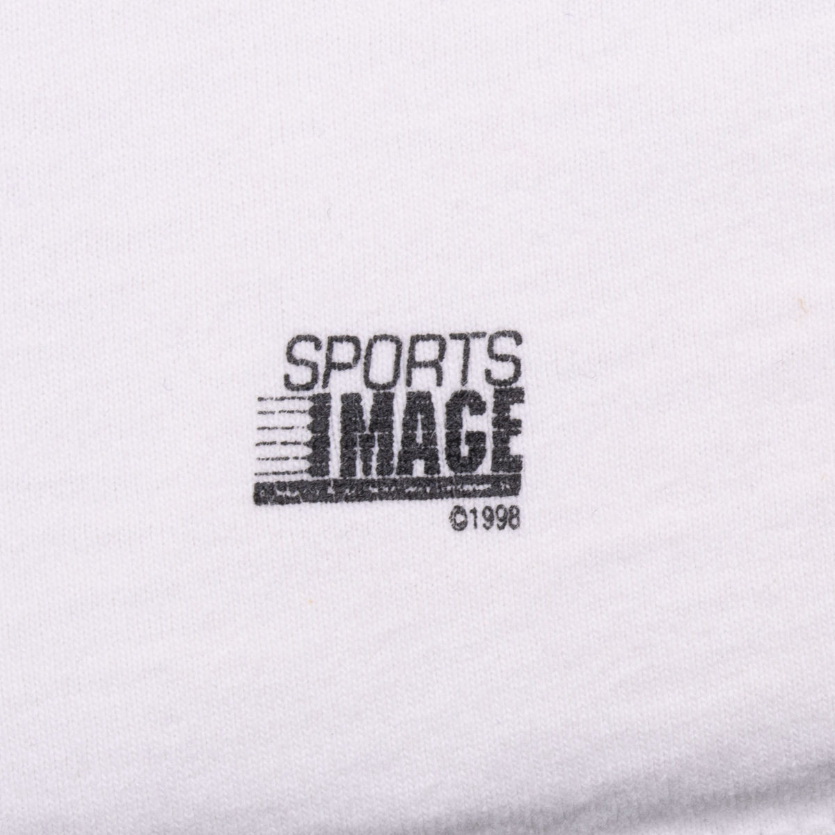 Sports Image 1998 copyright mark printed on white fabric