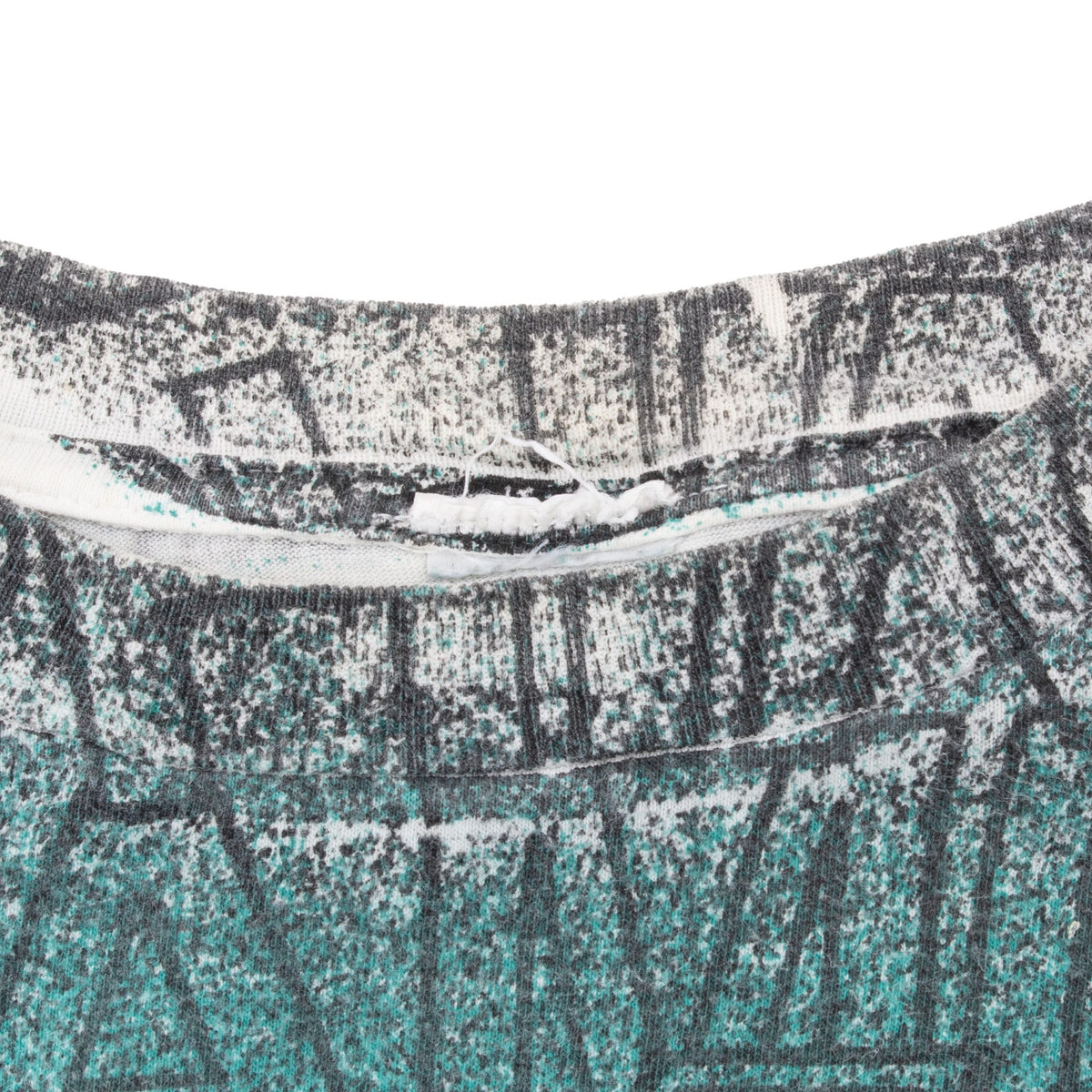 Inside crew neckline and collar seam detail of Miami Dolphins T-shirt