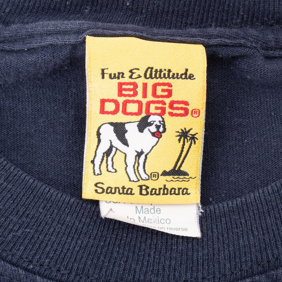 Big Dogs Fun & Attitude Santa Barbara neck tag on navy T-shirt