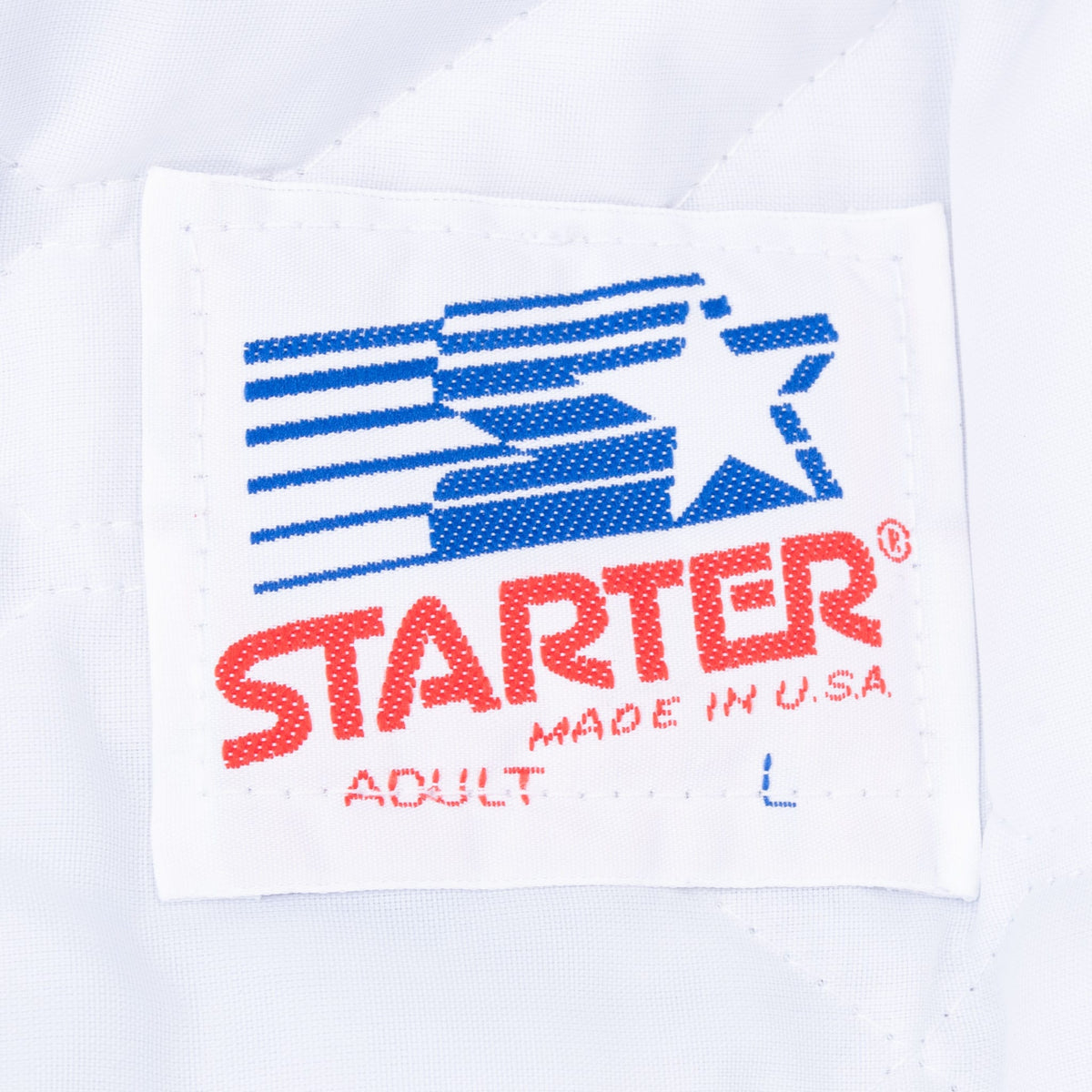 Starter neck tag marked Adult L and Made in U.S.A.