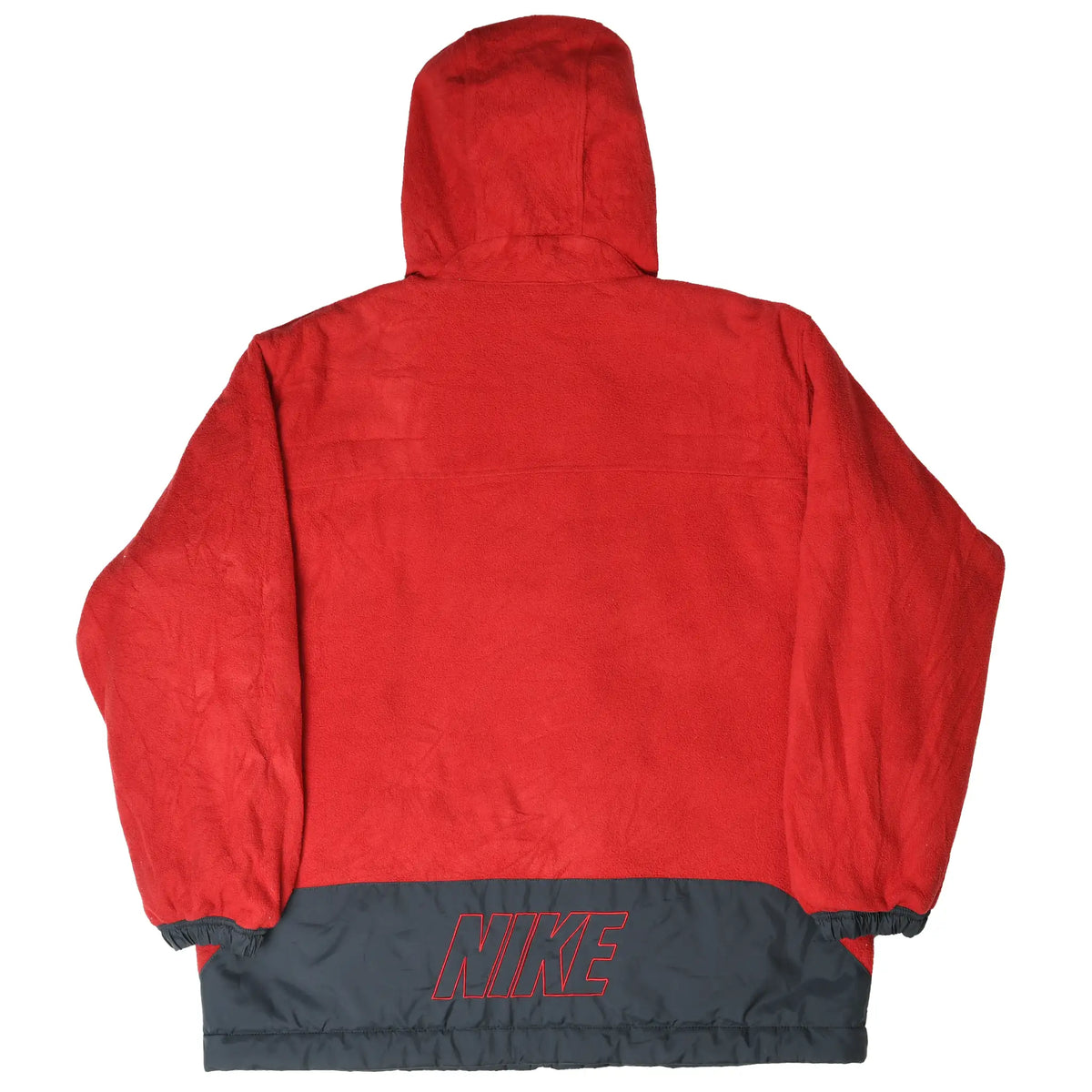 Back of reversible red Nike fleece jacket with hood and large outlined Nike logo on black lower panel