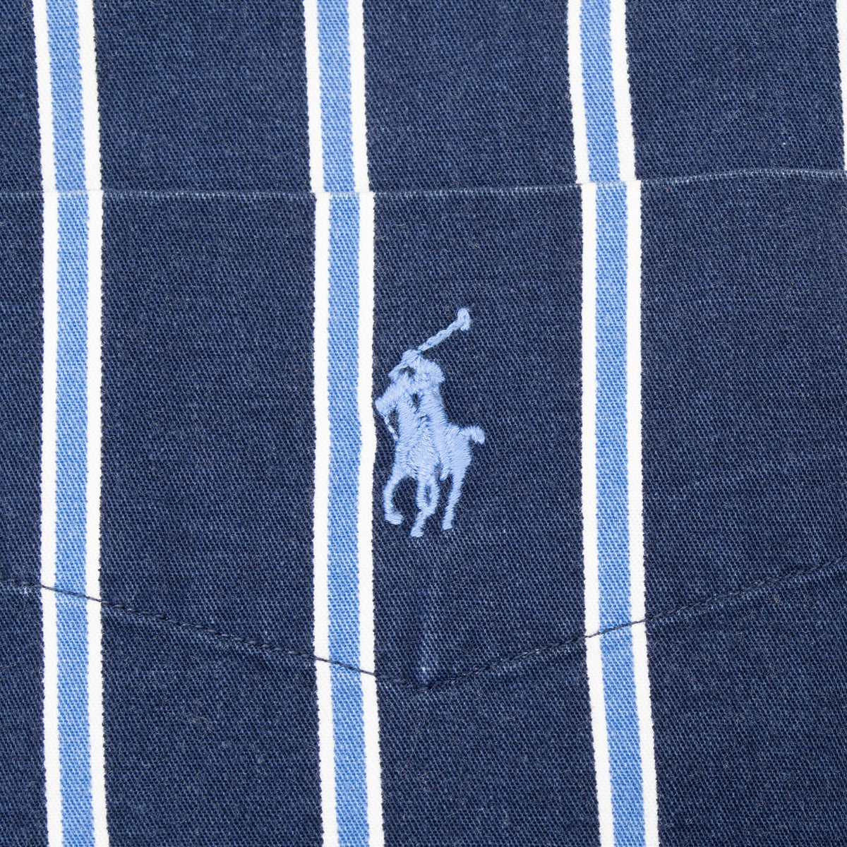 Light blue Polo pony embroidery on striped chest pocket
