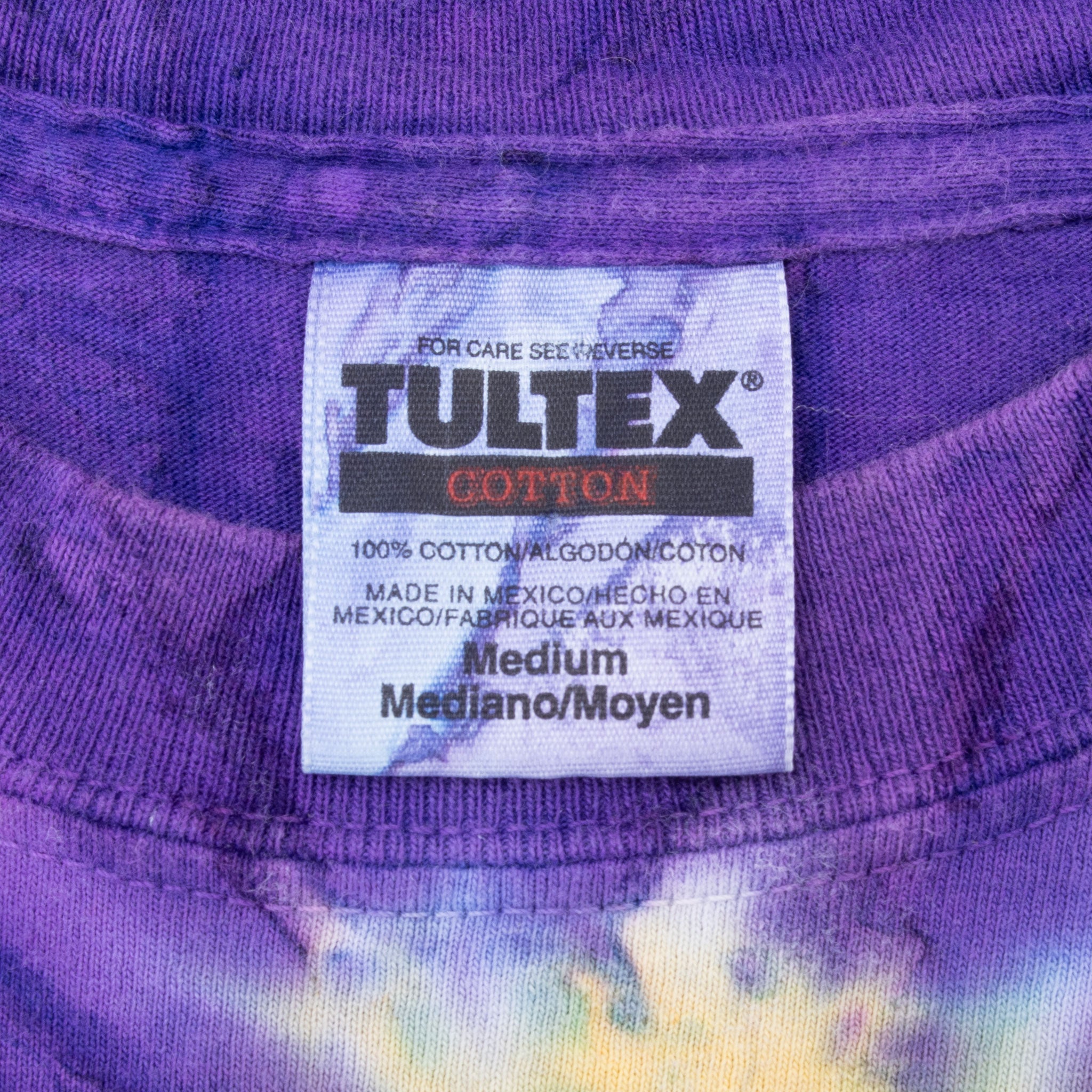 Tultex Cotton medium neck tag on purple tie-dye Minnesota Vikings tee