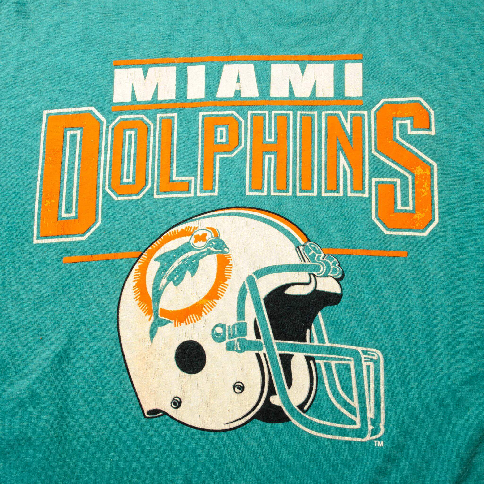 Vintage NFL Miami Dolphins Tee Shirt Size Medium Made In USA With Single Stitch Sleeves.