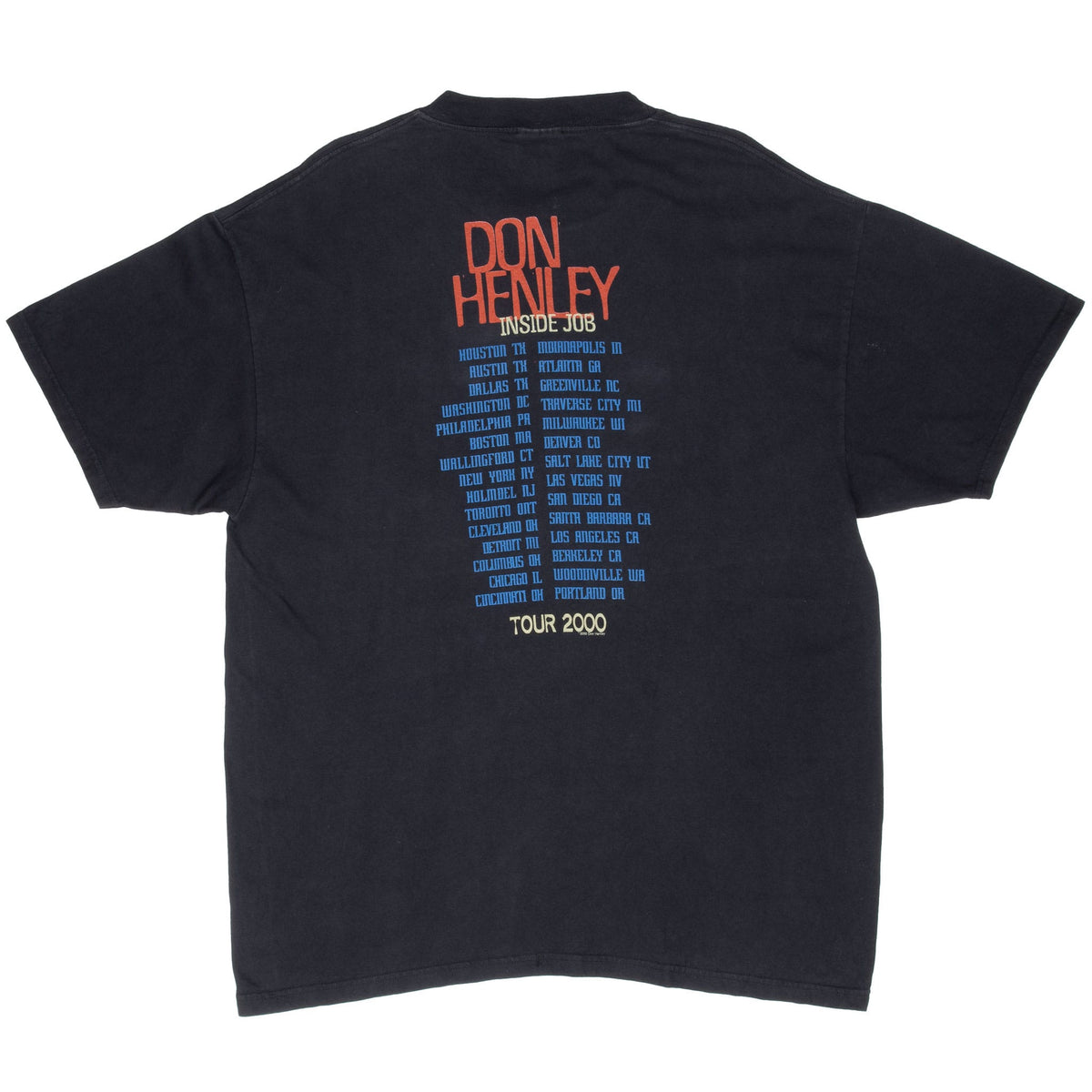 Back of black Don Henley Inside Job Tour 2000 T-shirt with two-column city list