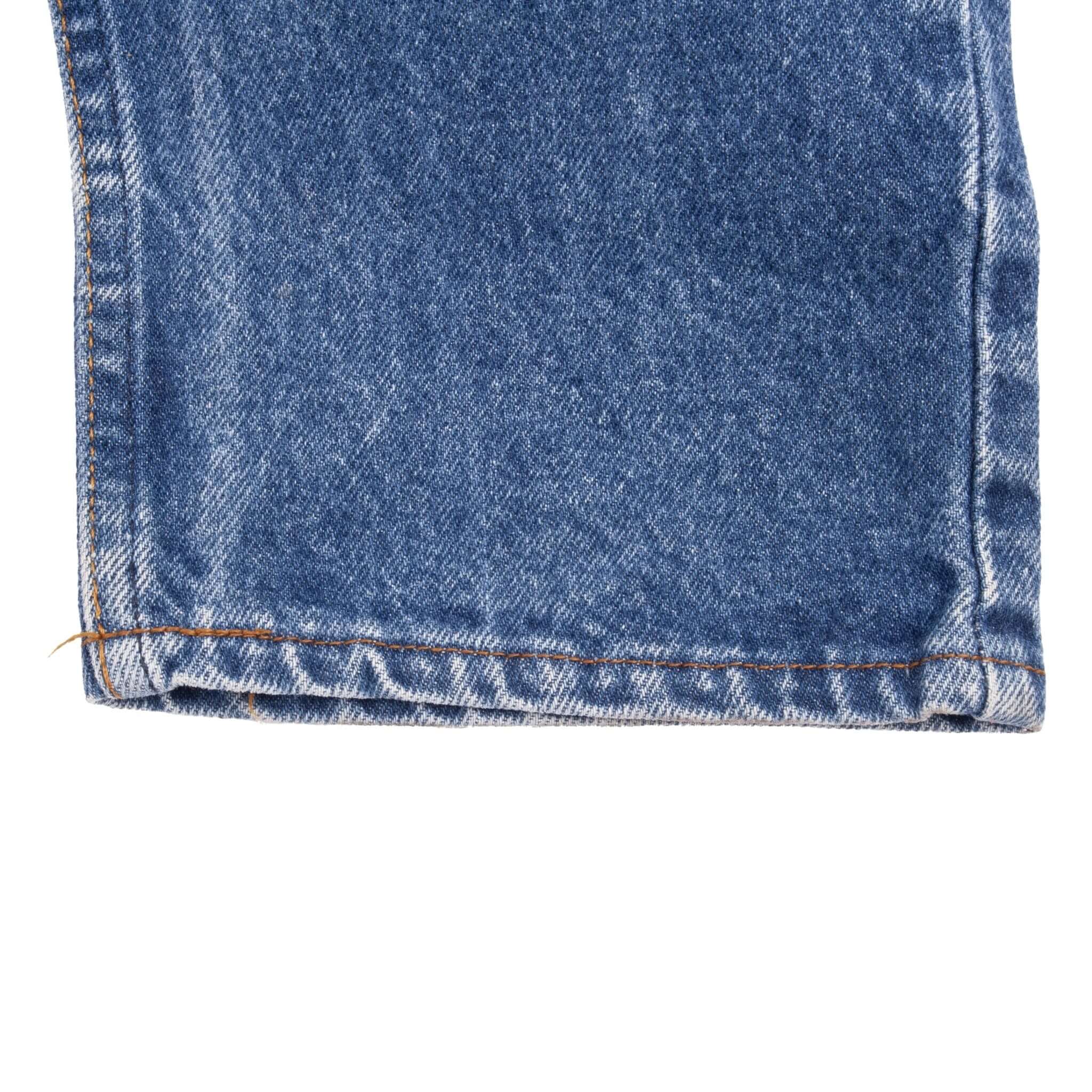 Beautiful Indigo Levis 505 Jeans Made in USA with a medium light blue wash.  Size on Tag 31X34  Back Button #650