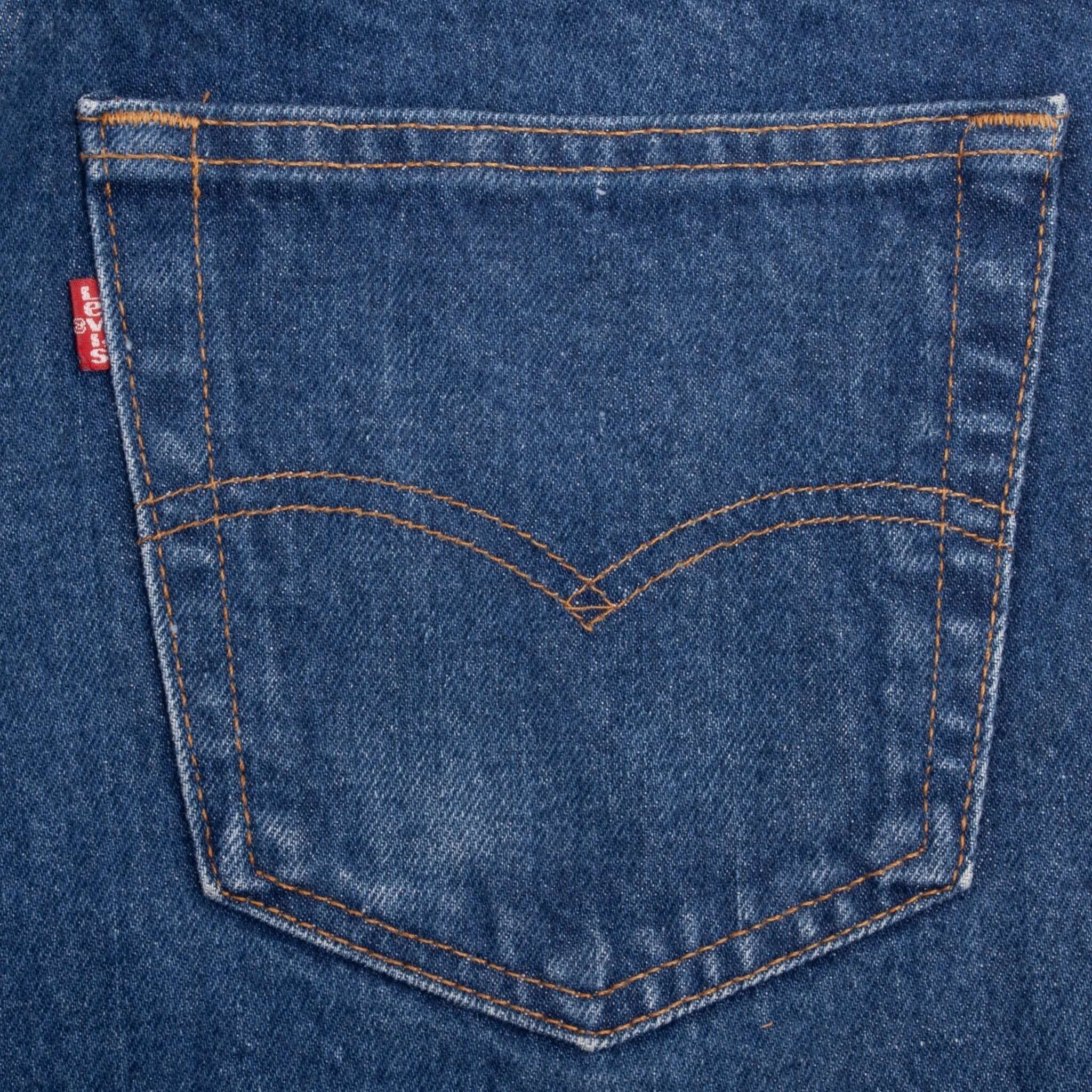 Beautiful Indigo Levis 505 Jeans Made in USA with a medium blue wash.  Size on Tag 32X34 Actual Size 32X33 Back Button #552