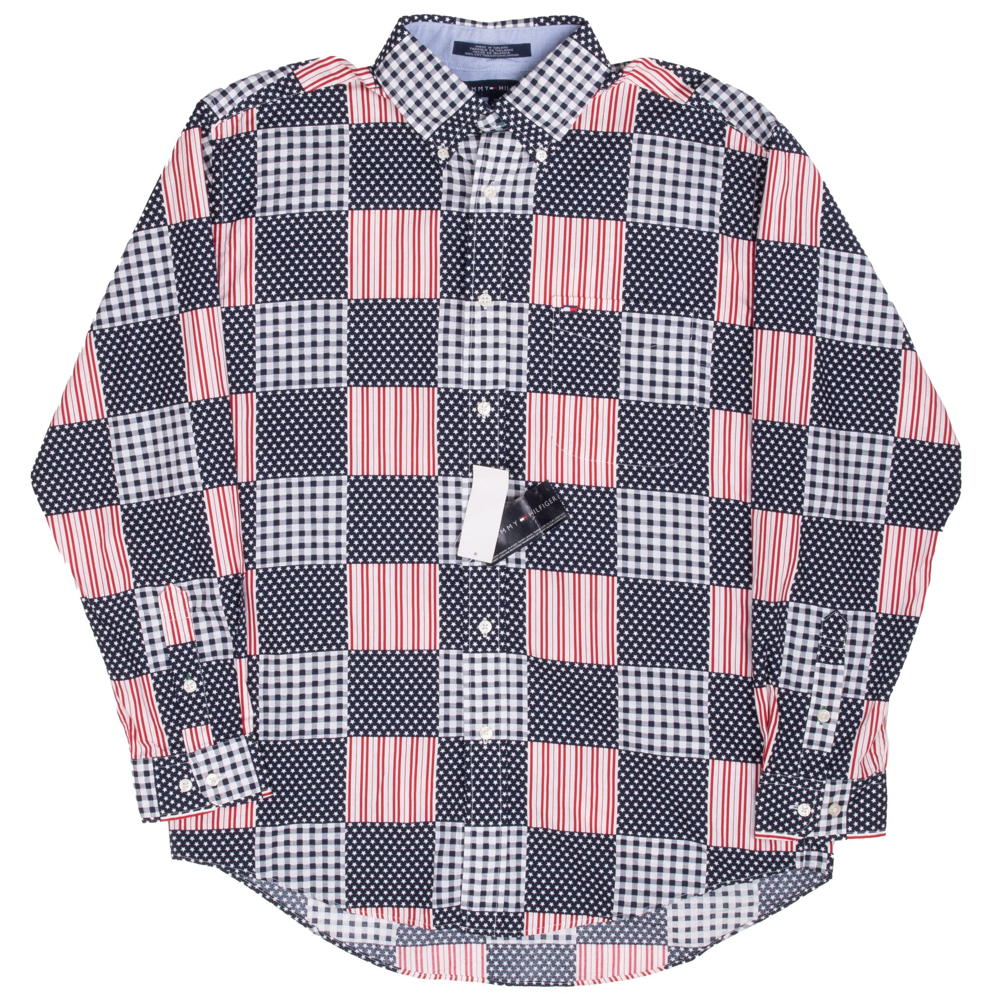 Full front view of Tommy Hilfiger long-sleeve flag patchwork shirt with curved hem and attached tags